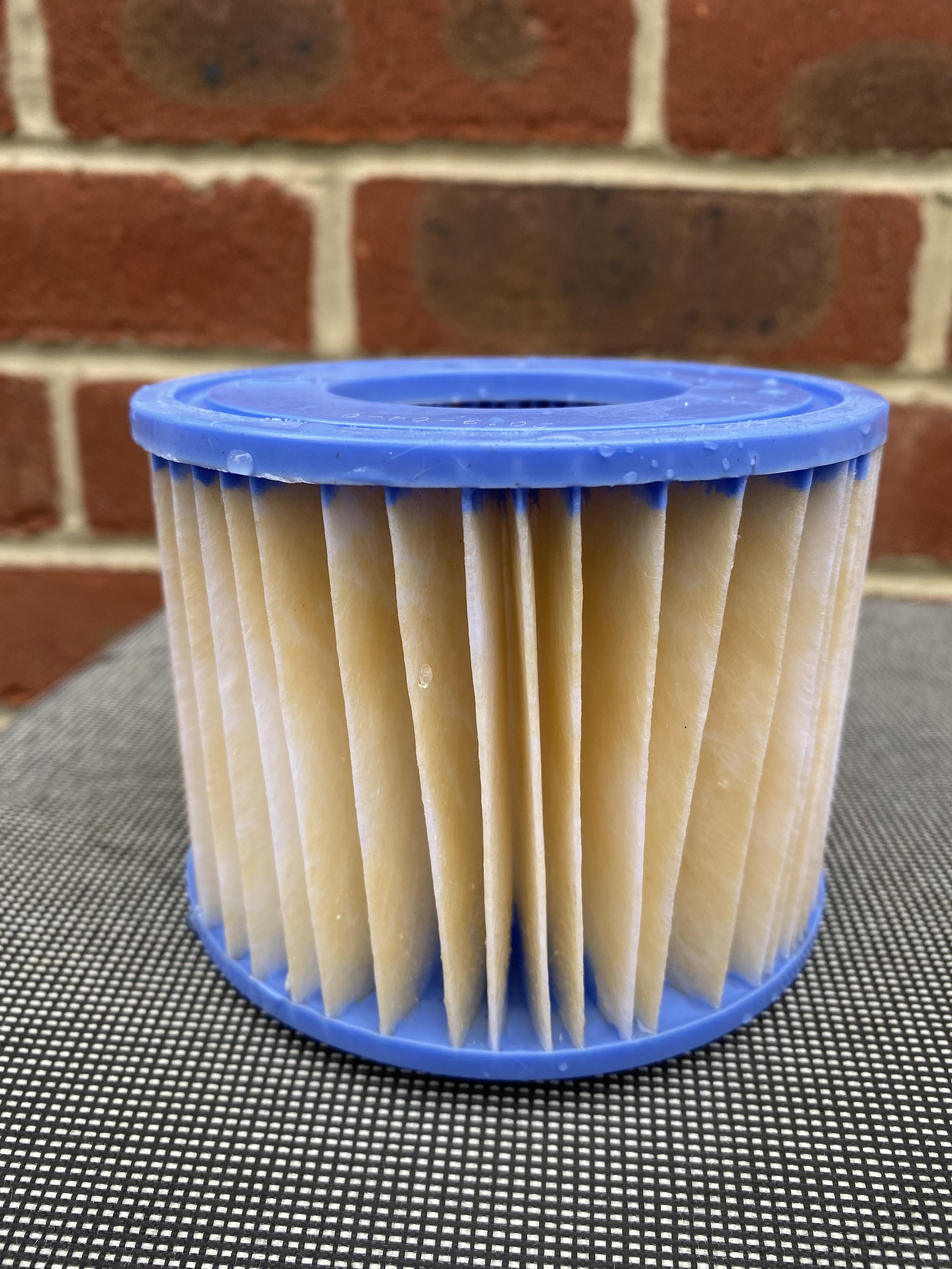 Can anyone identify this yellow stuff on my hot tub filter? r/hottub