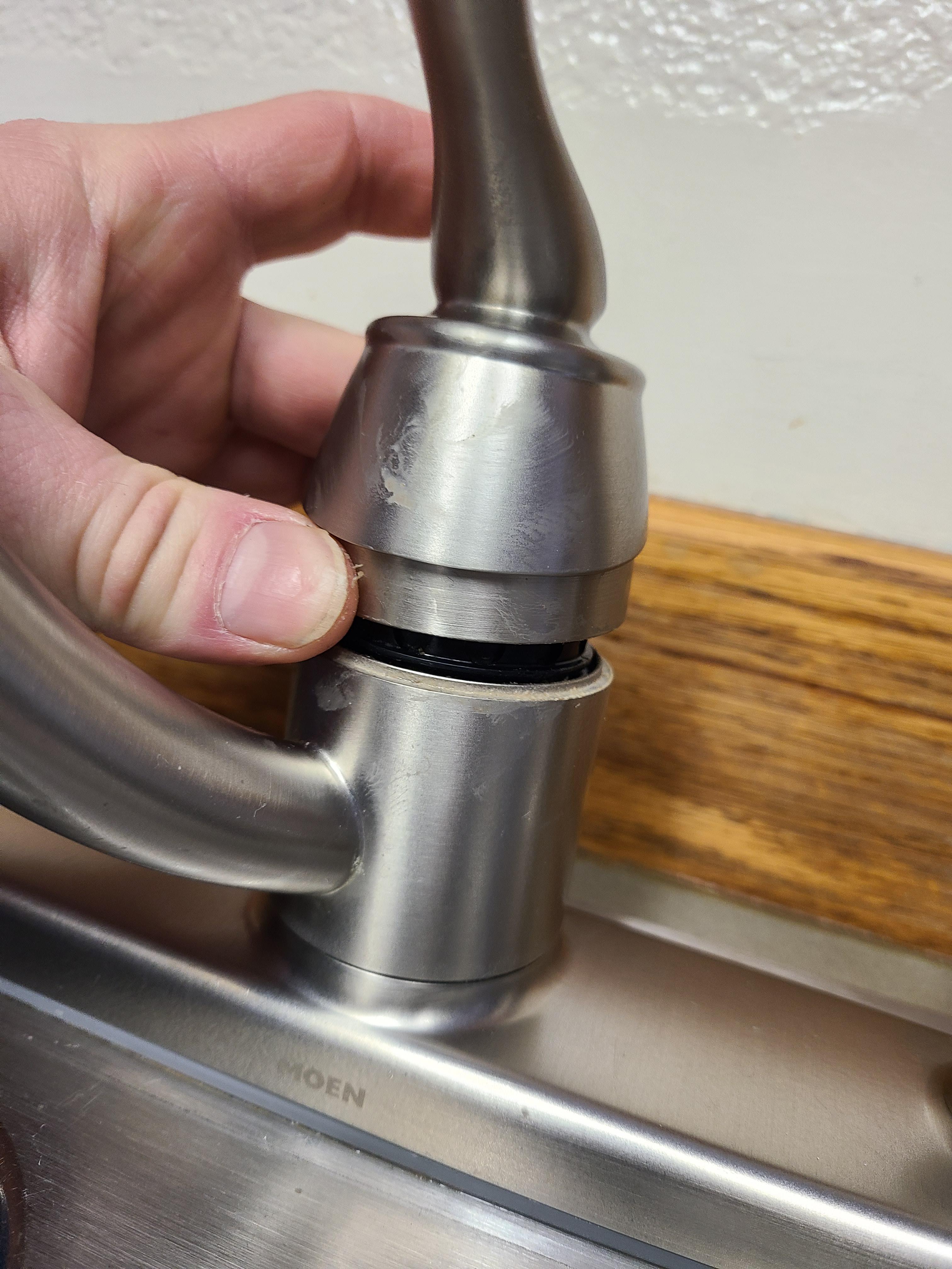 Spout is loose , no way to tighten underneath sink.this sleeve raises