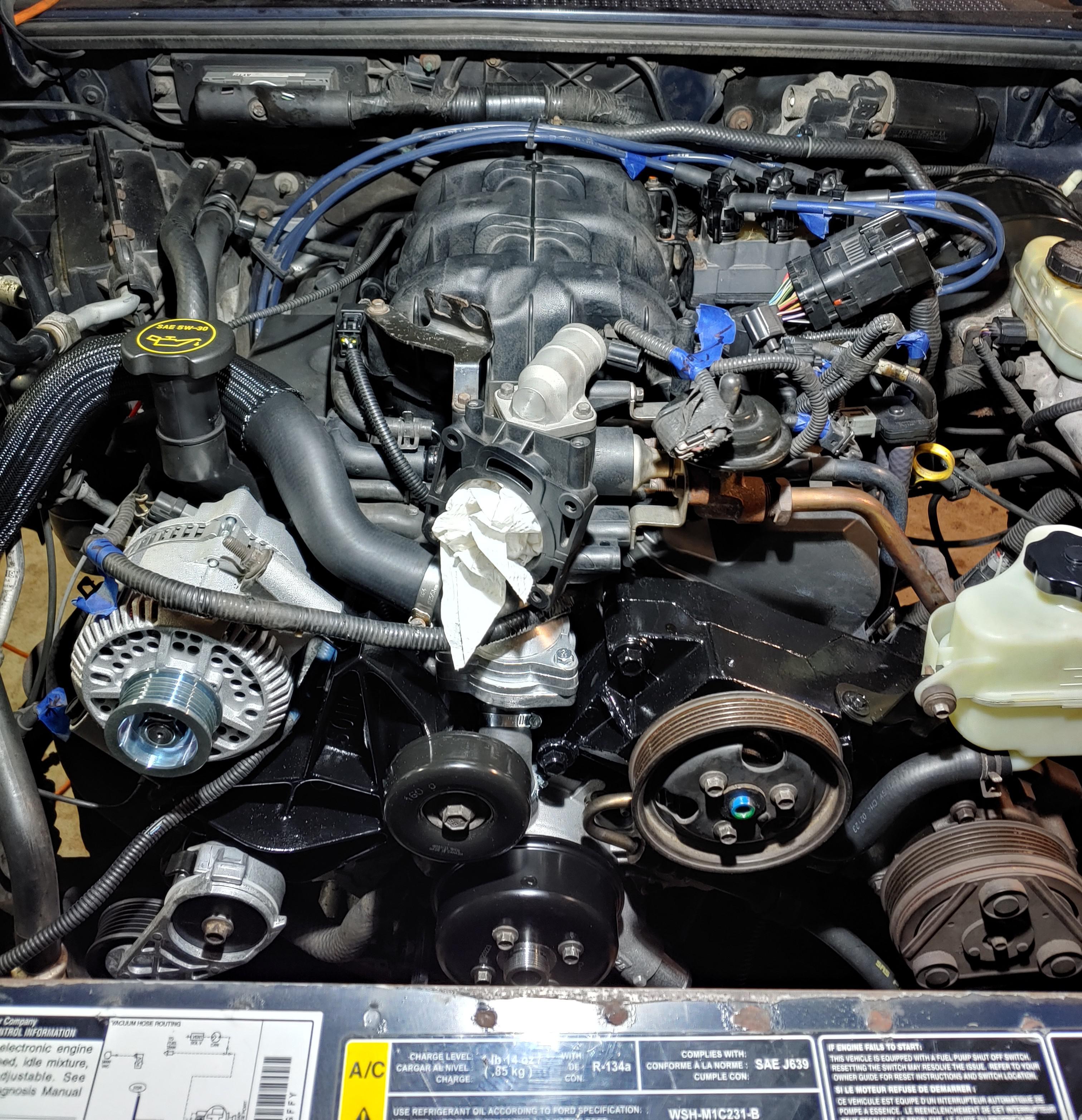 New water pump, thermostat housing, power steering pump, alternator amd