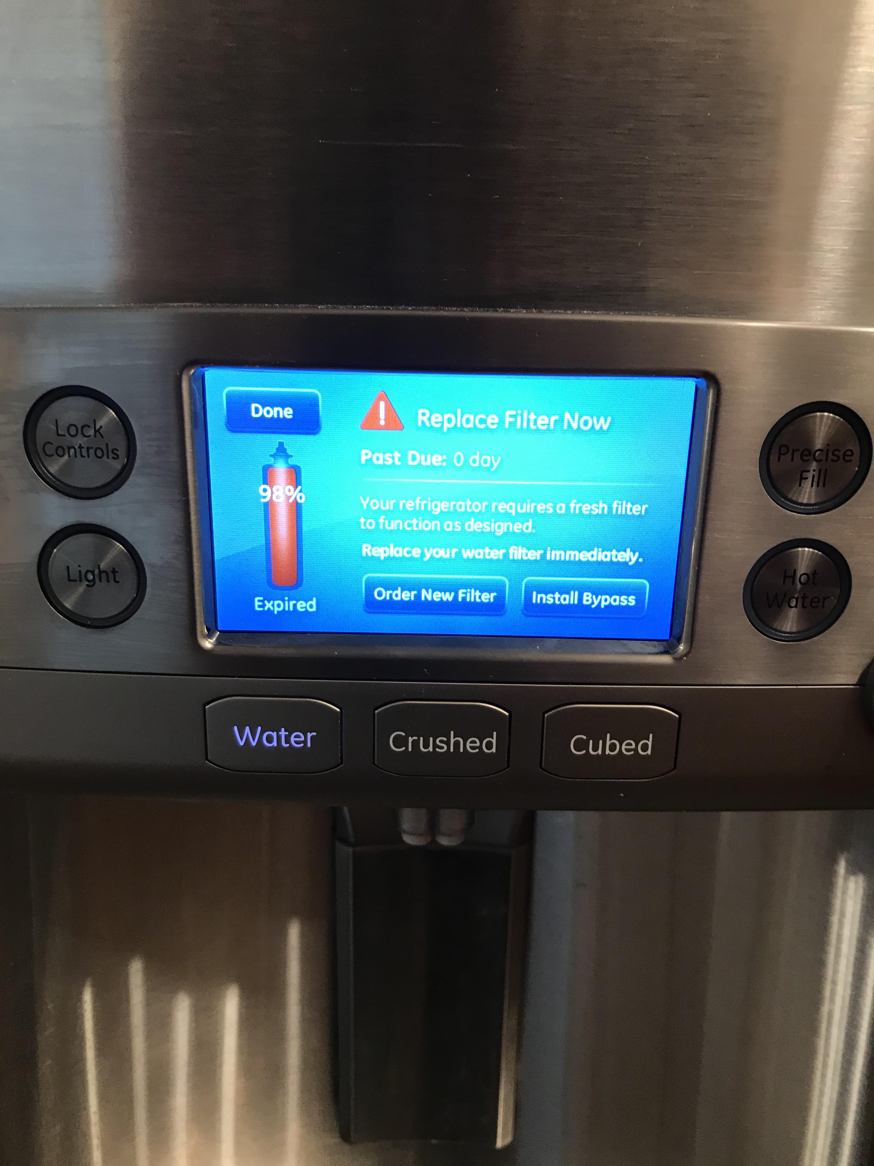 GE refrigerator will not let me access ice or water after filter change. It is the correct