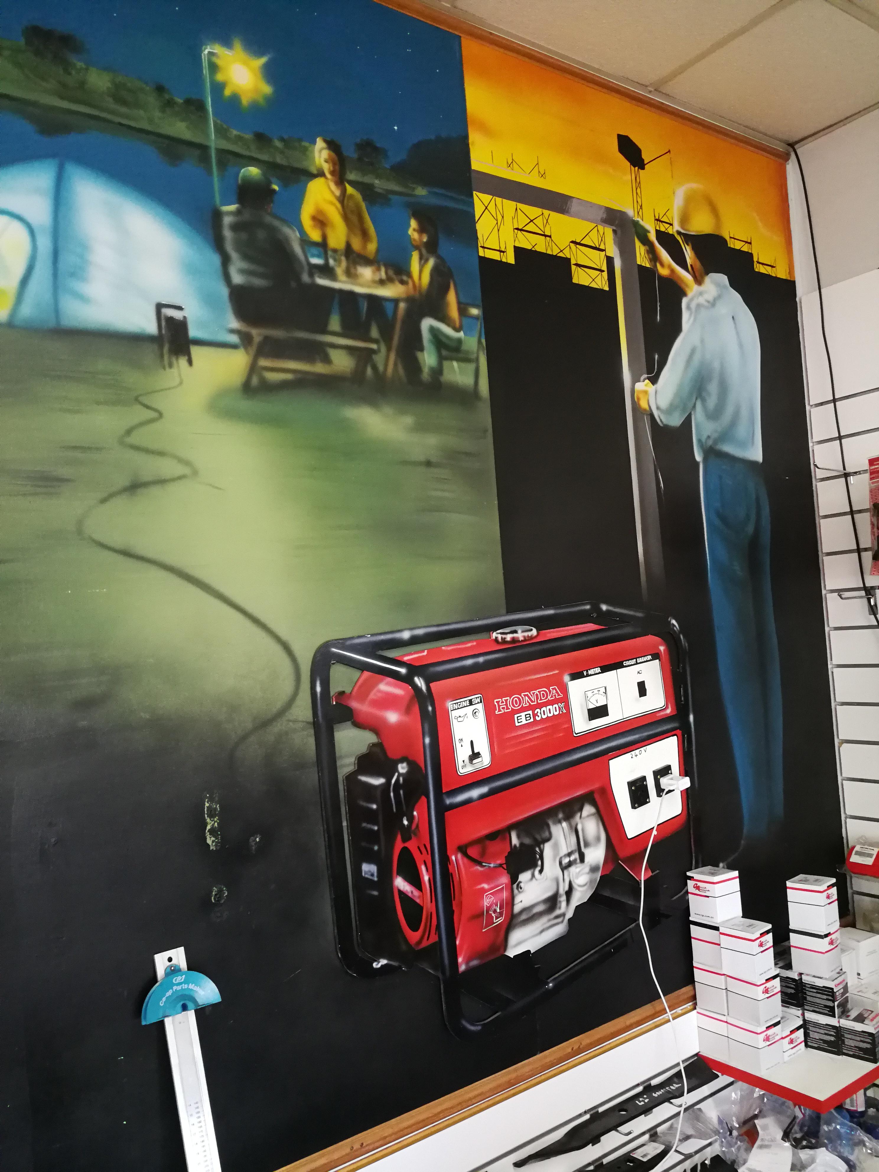 The painting of a generator on the wall of my local mower shop has