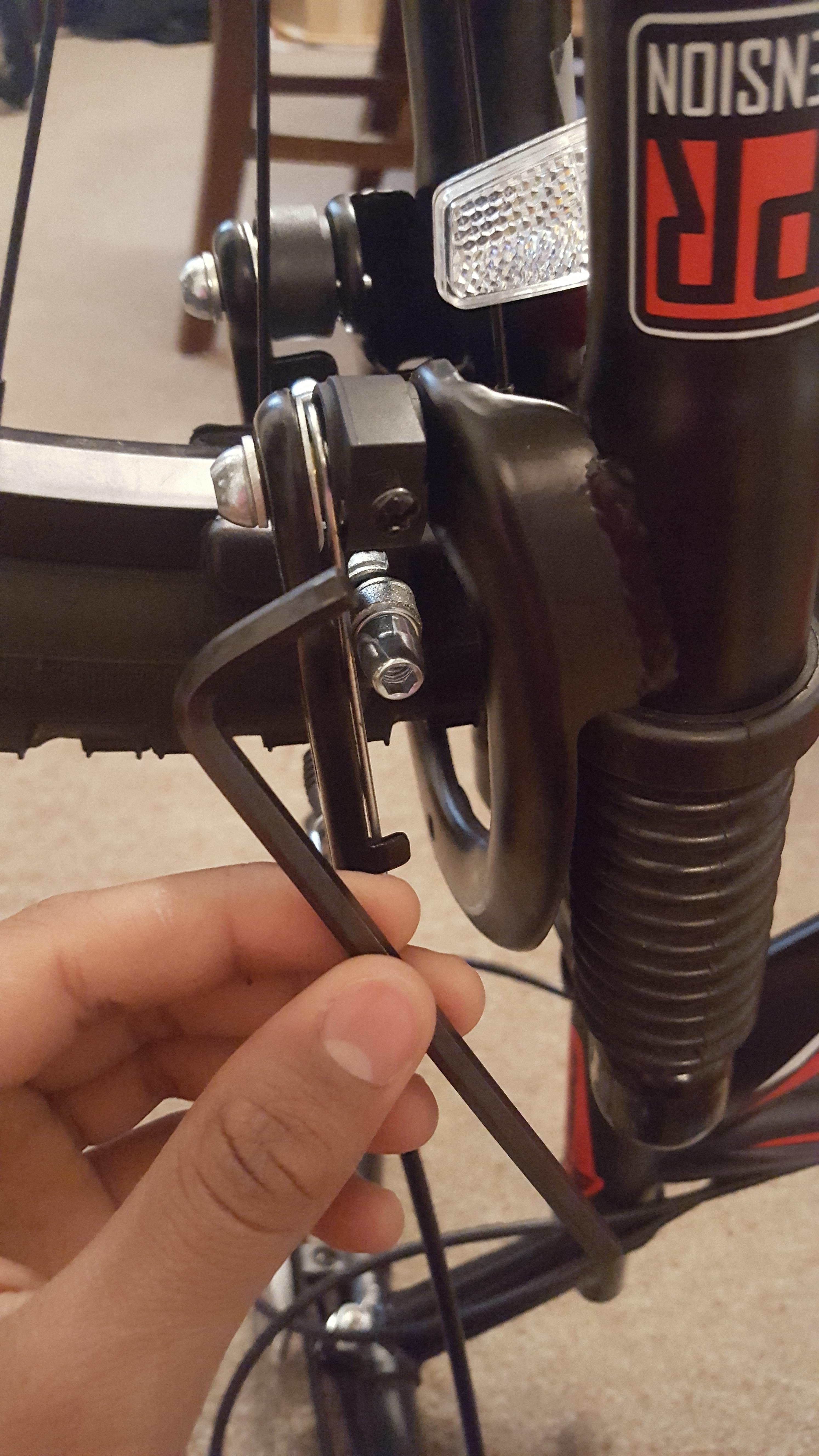 Im trying to loosen the brake pad nut but it doesnt loosen. Is the the