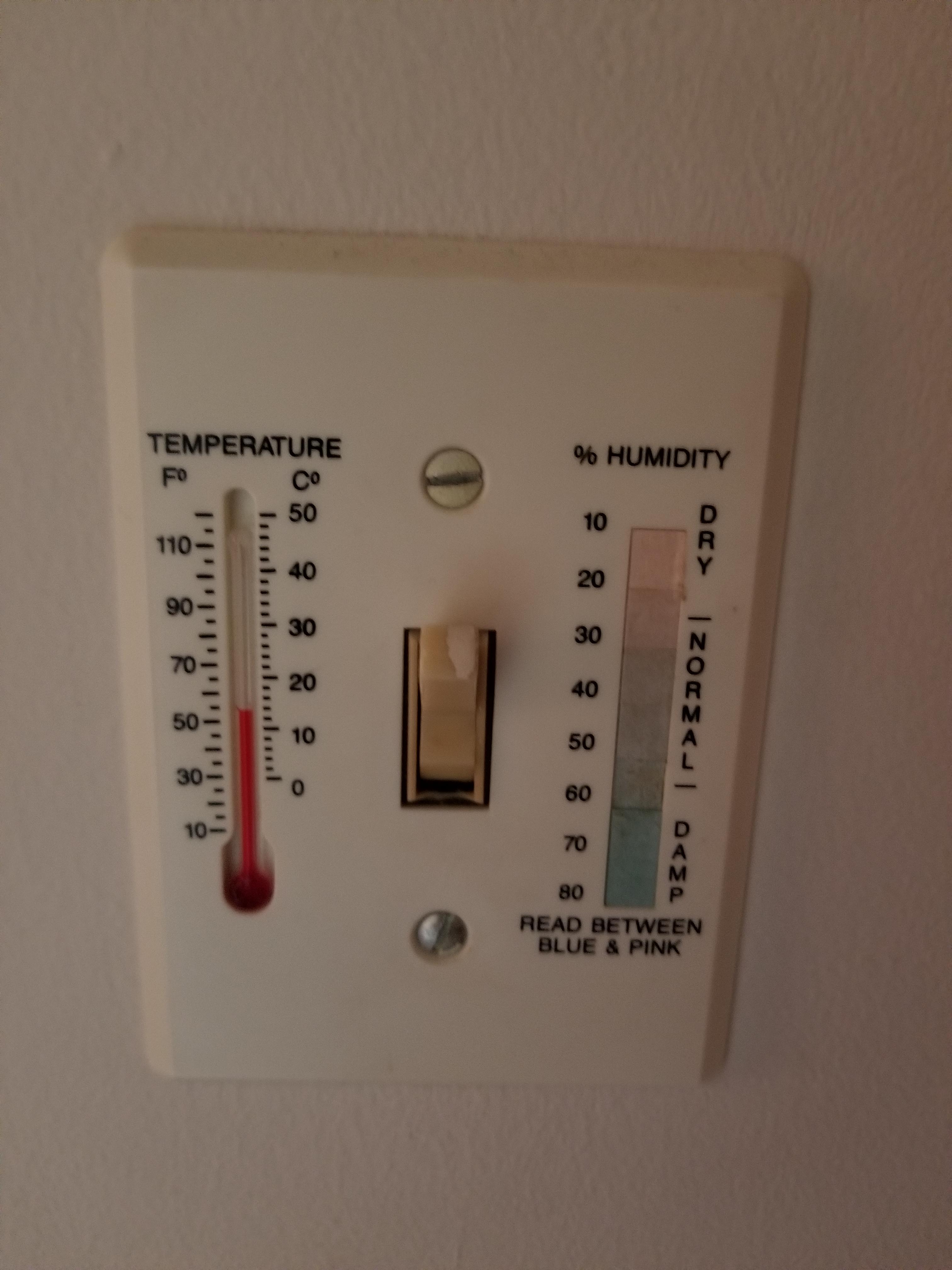 This light switch that has a temperature and humidity gage. r