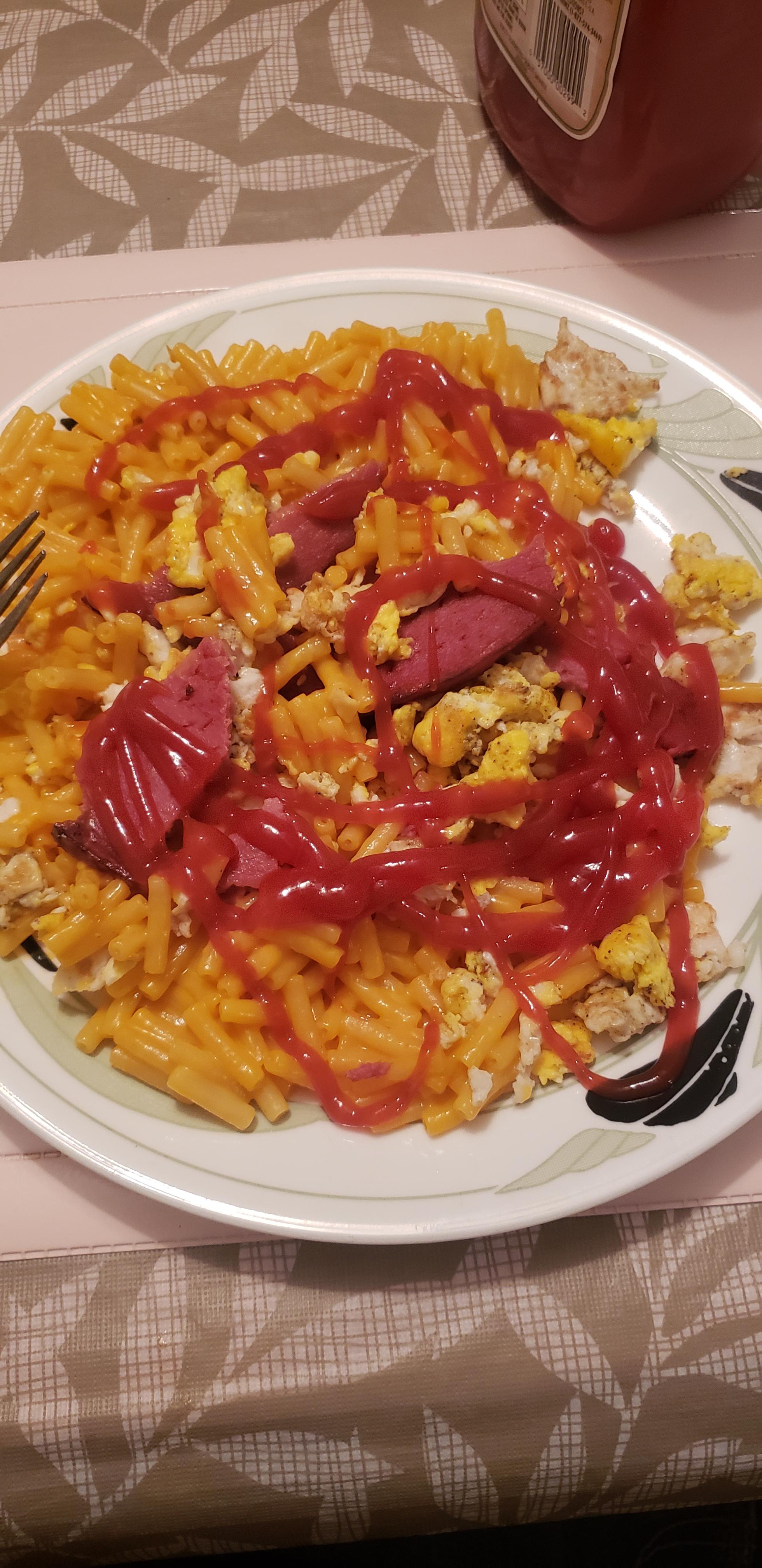 Kraft dinner, Egg, Bologna topped with ketchup for supper r