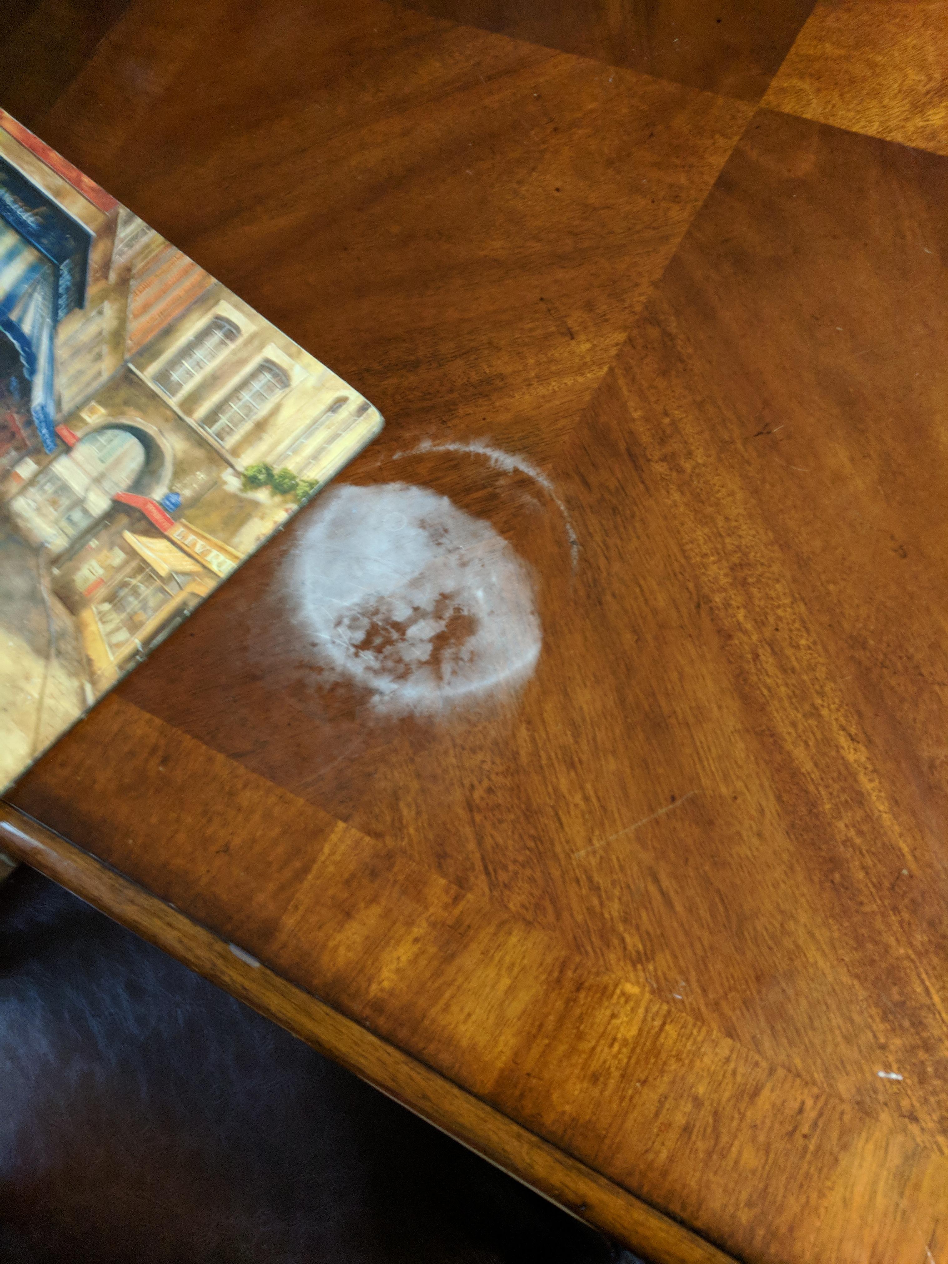 I messed up... Any easy fix? Hot plate on stained table. r/Woodwork