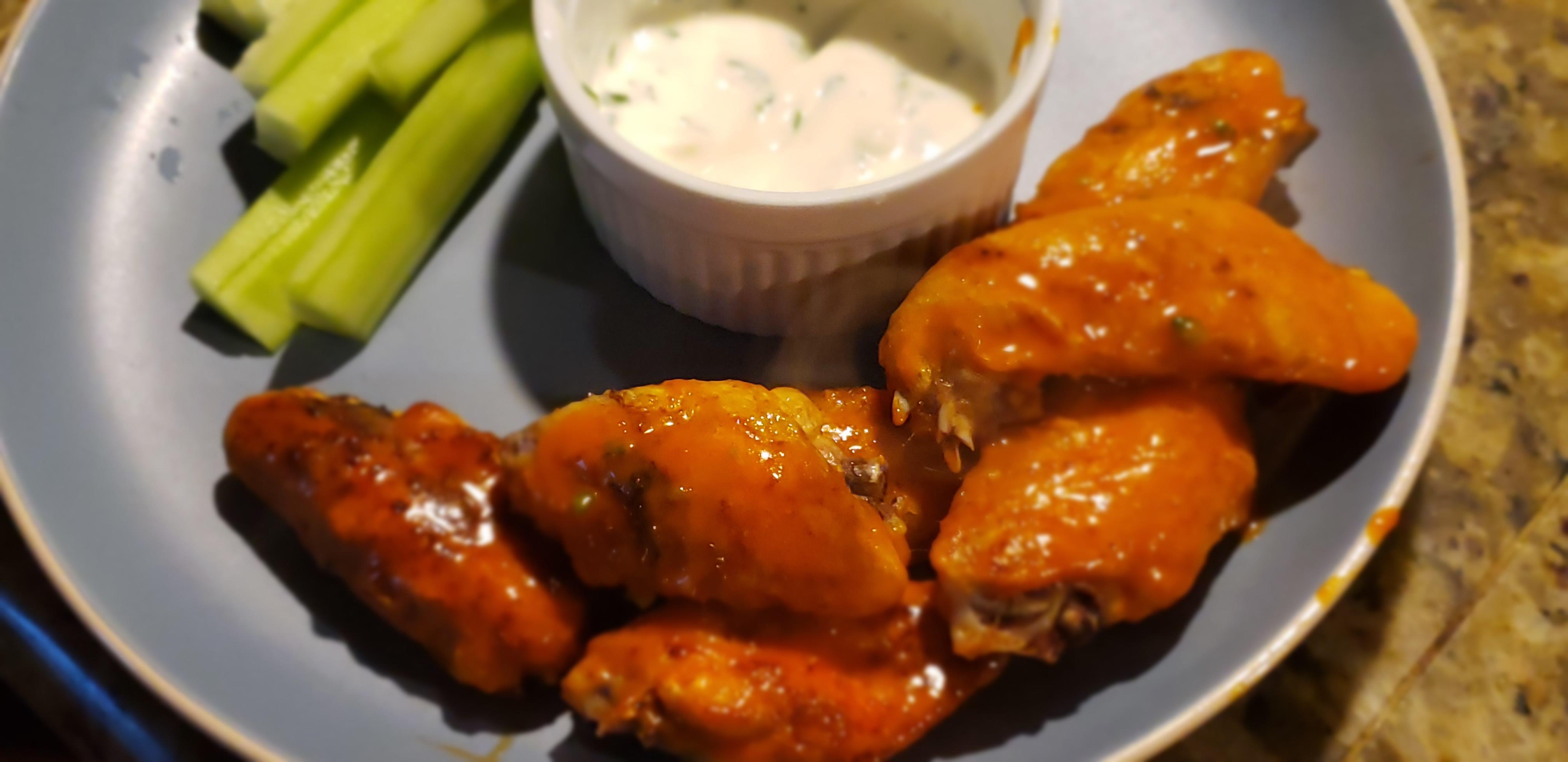 Love flats, Franks + Green Pepper Cholula + diced jalapeños in hot wing