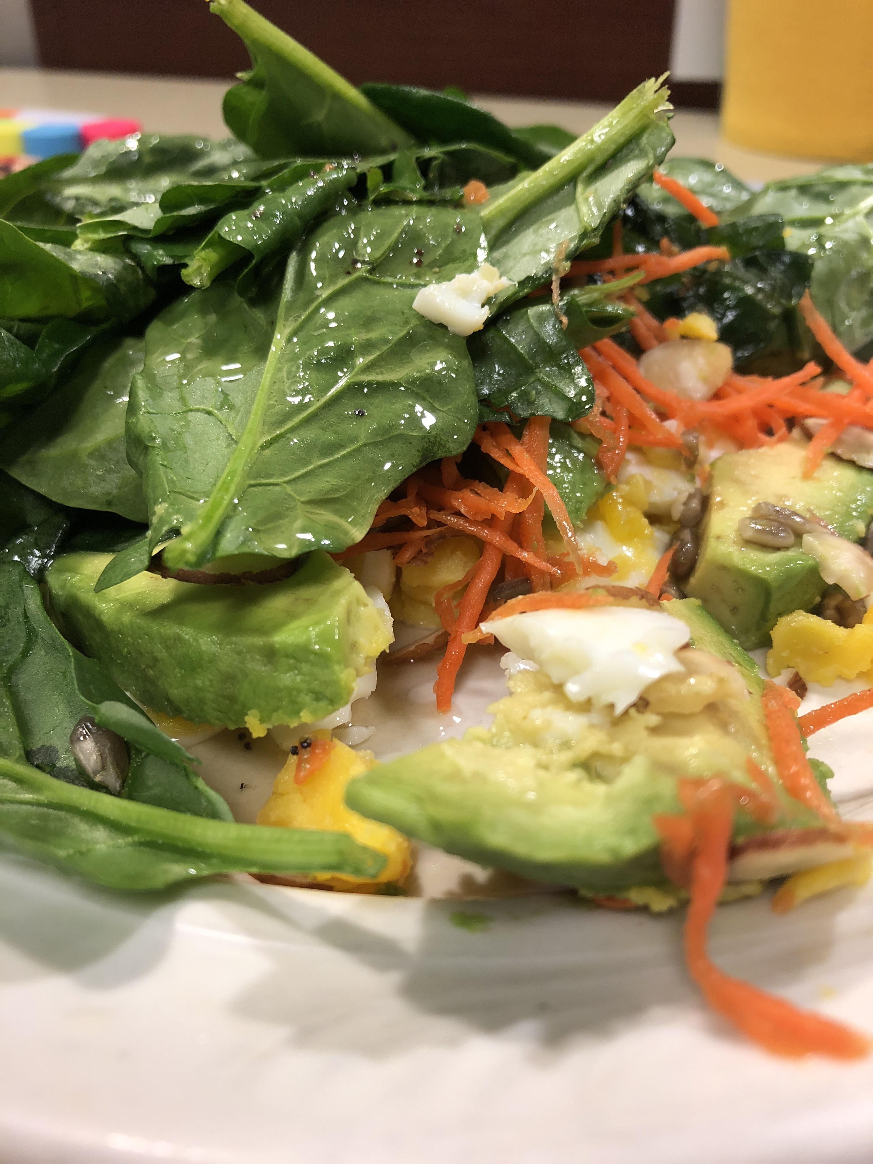 Day One Salad c spinach leaves, avocado, julienne carrots, sunflower