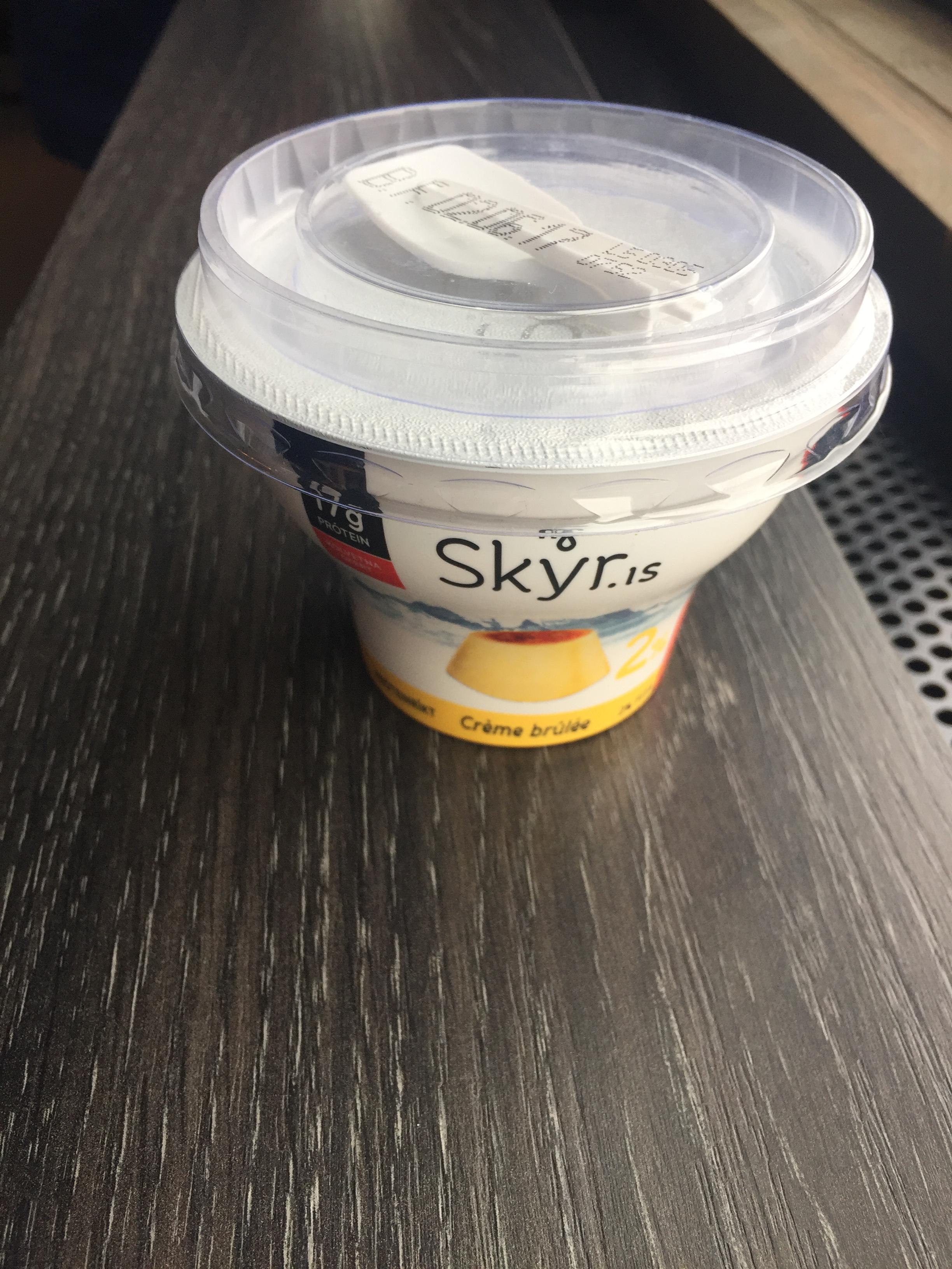 Yogurt I got in Iceland has a mini folded plastic spoon that's fitted to the lid. r