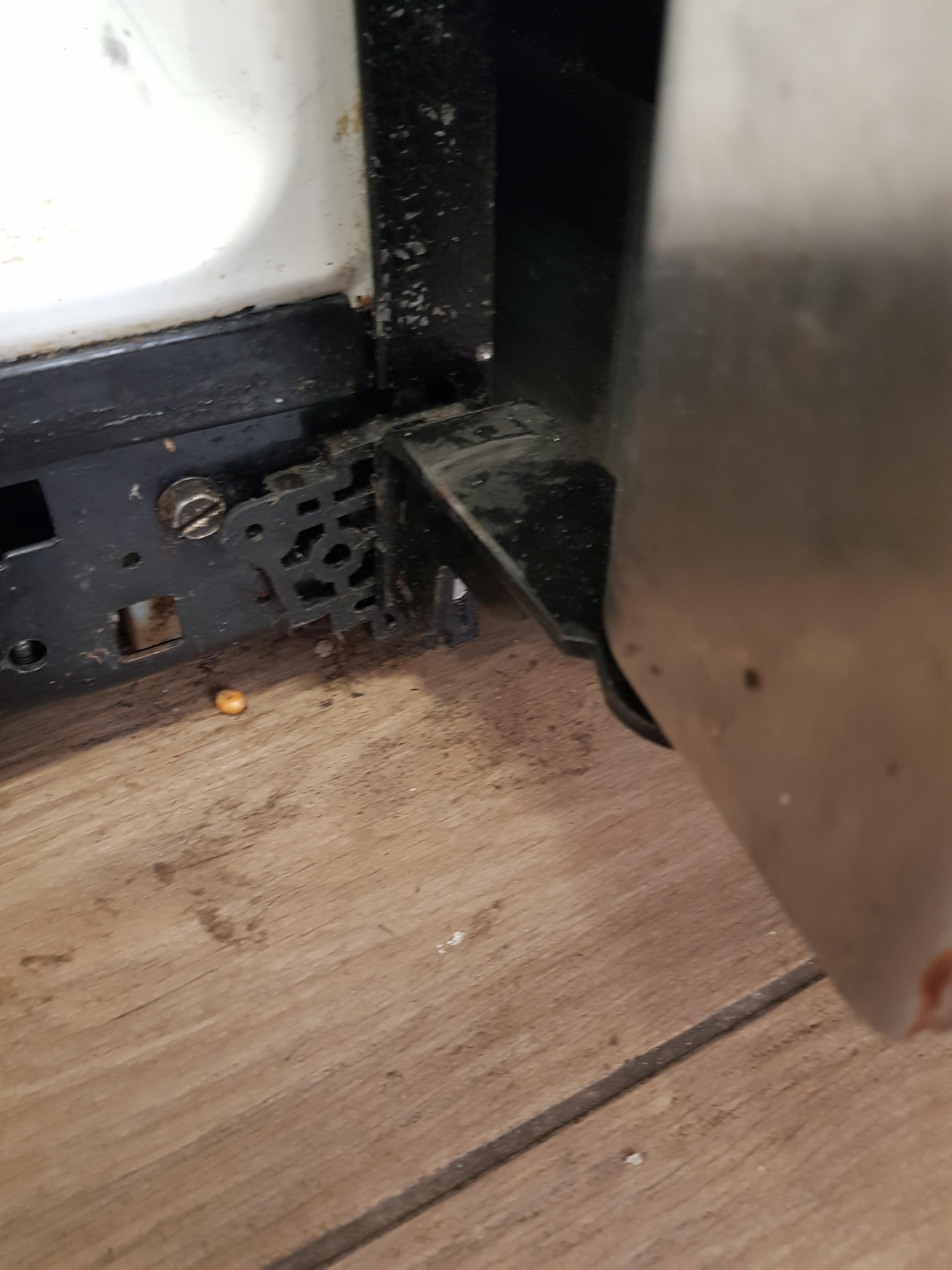 Can I safely drill a new hole in this refrigerator frame? Screw broke