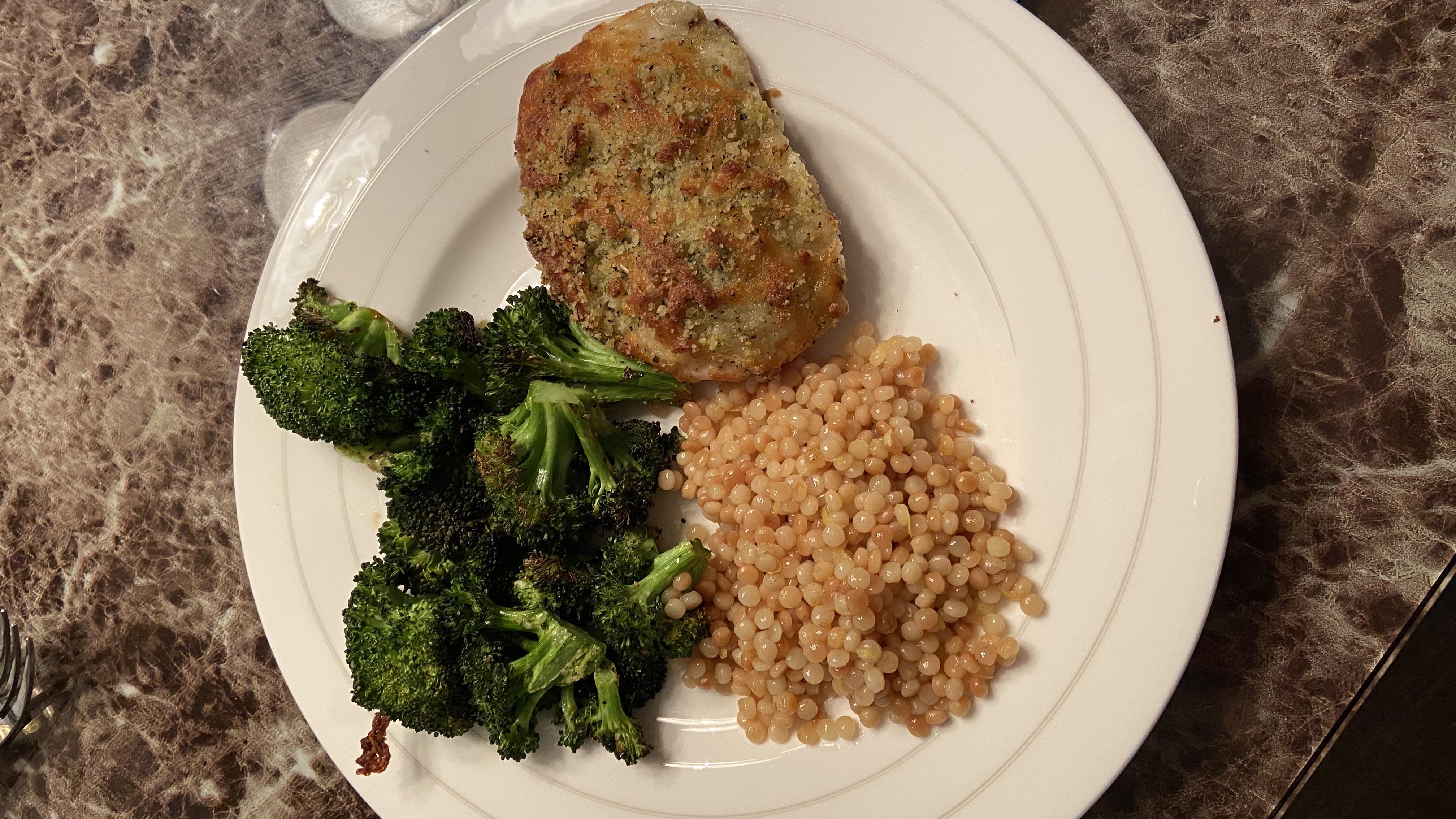 Mozzarella crusted chicken with Israeli couscous and roasted broccoli