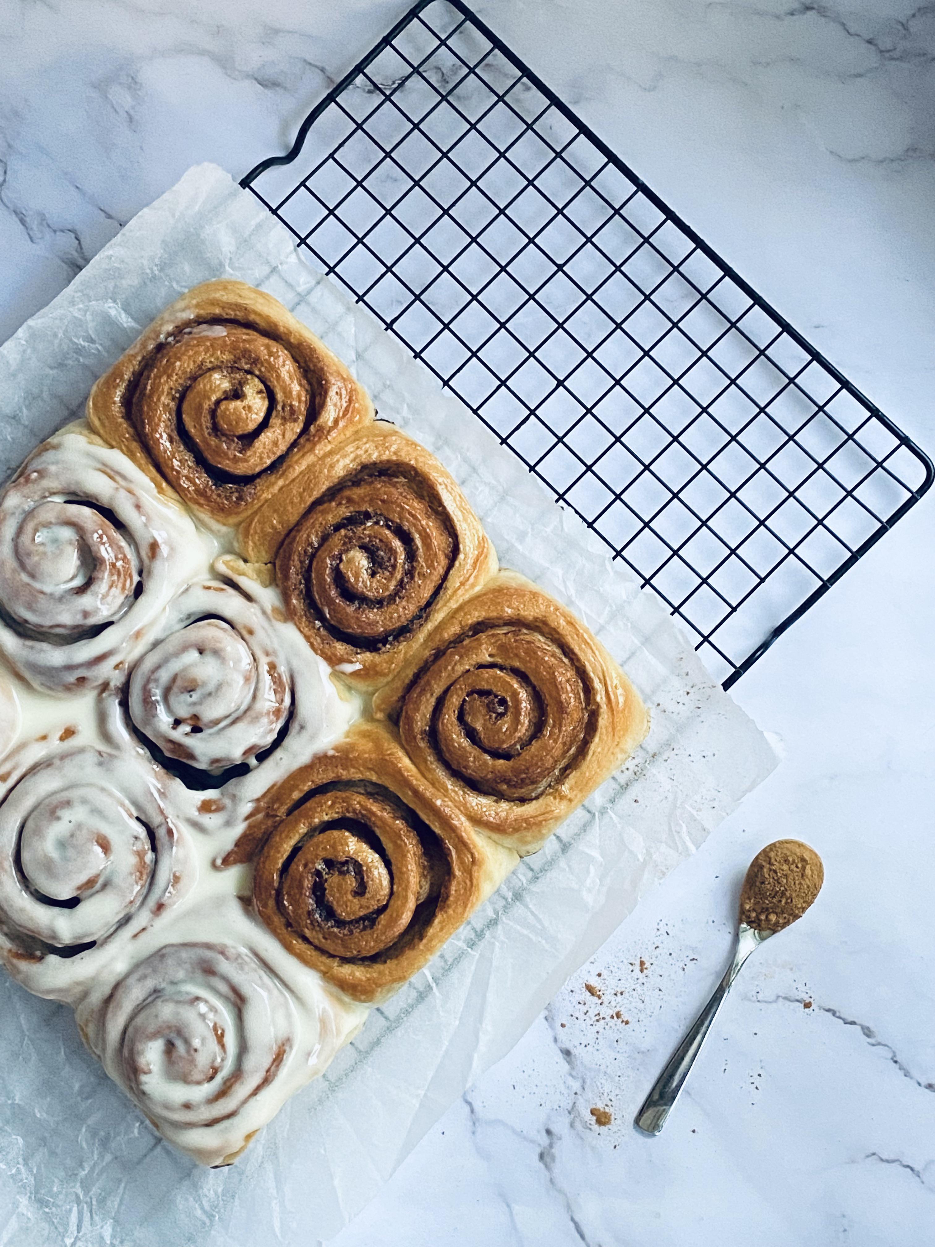Cinnamon rolls with cream cheese glaze to brighten up any day. r/Breadit