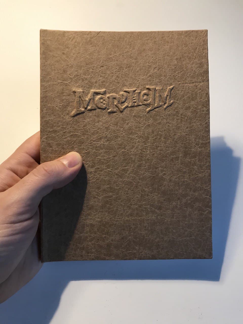 I printed and bound the rulebook, now I can check if I like the game