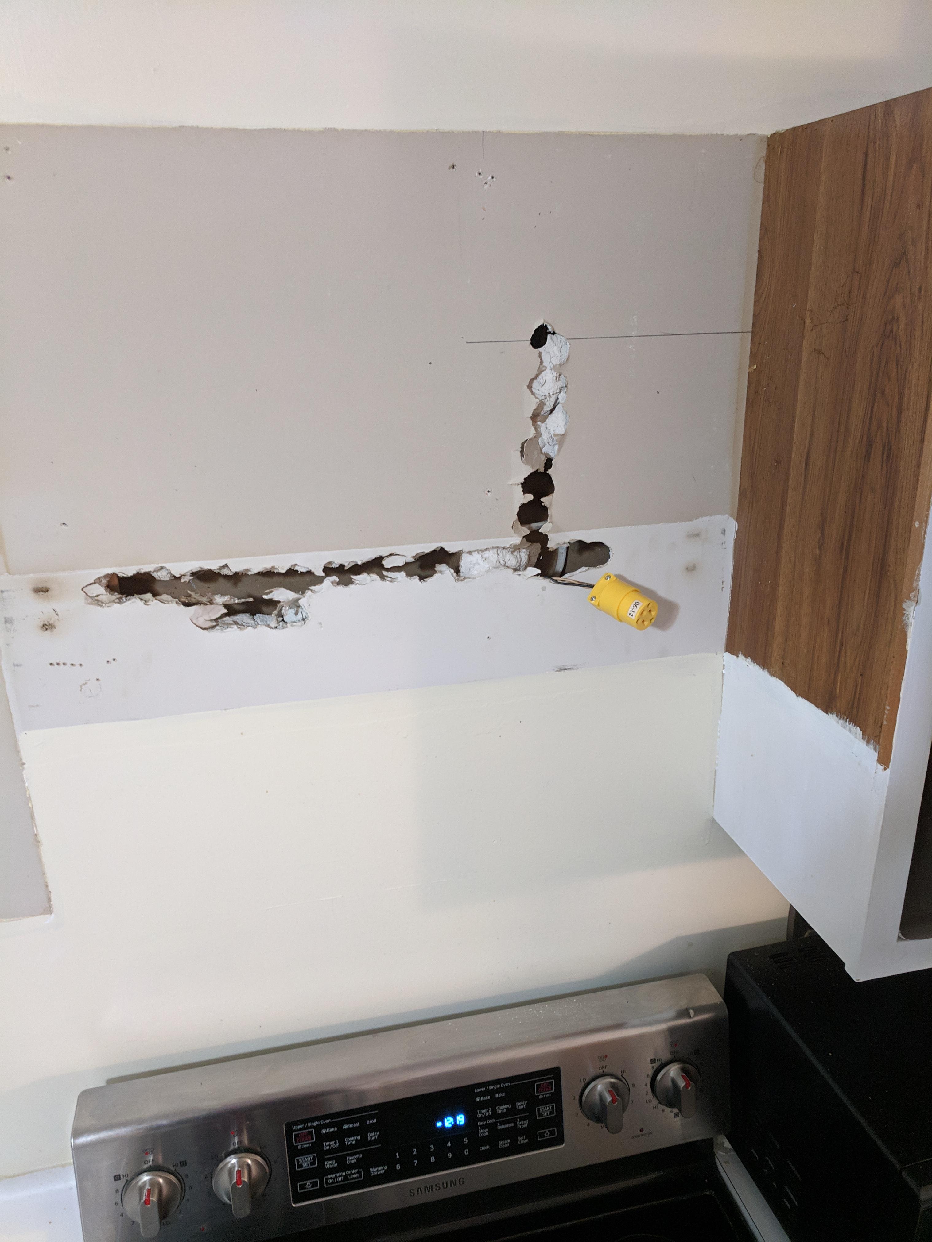 Replacing my kitchen and found this hidden behind my range