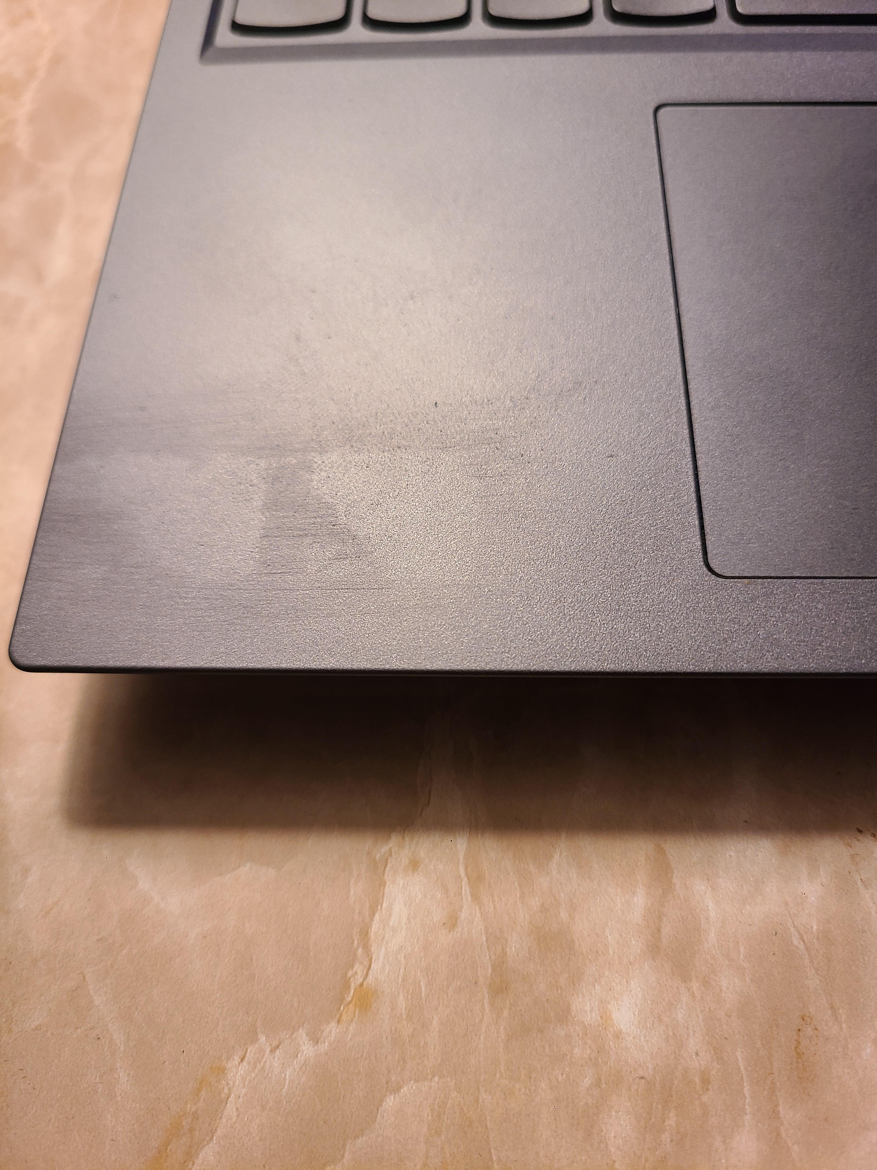 Remove sticker residue & scratch marks from laptop? : r/howto