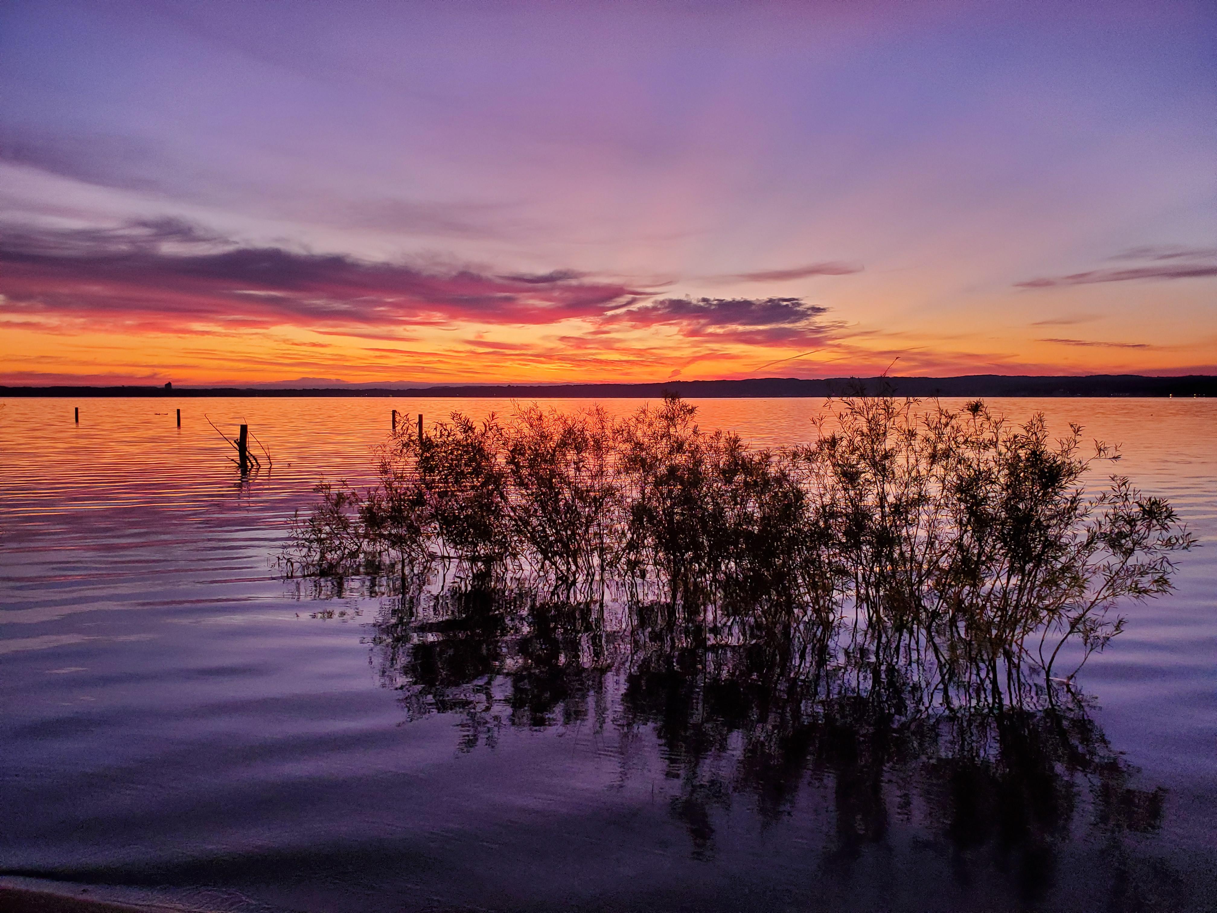 Sunrise over East Bay in Traverse City this morning. r/Michigan
