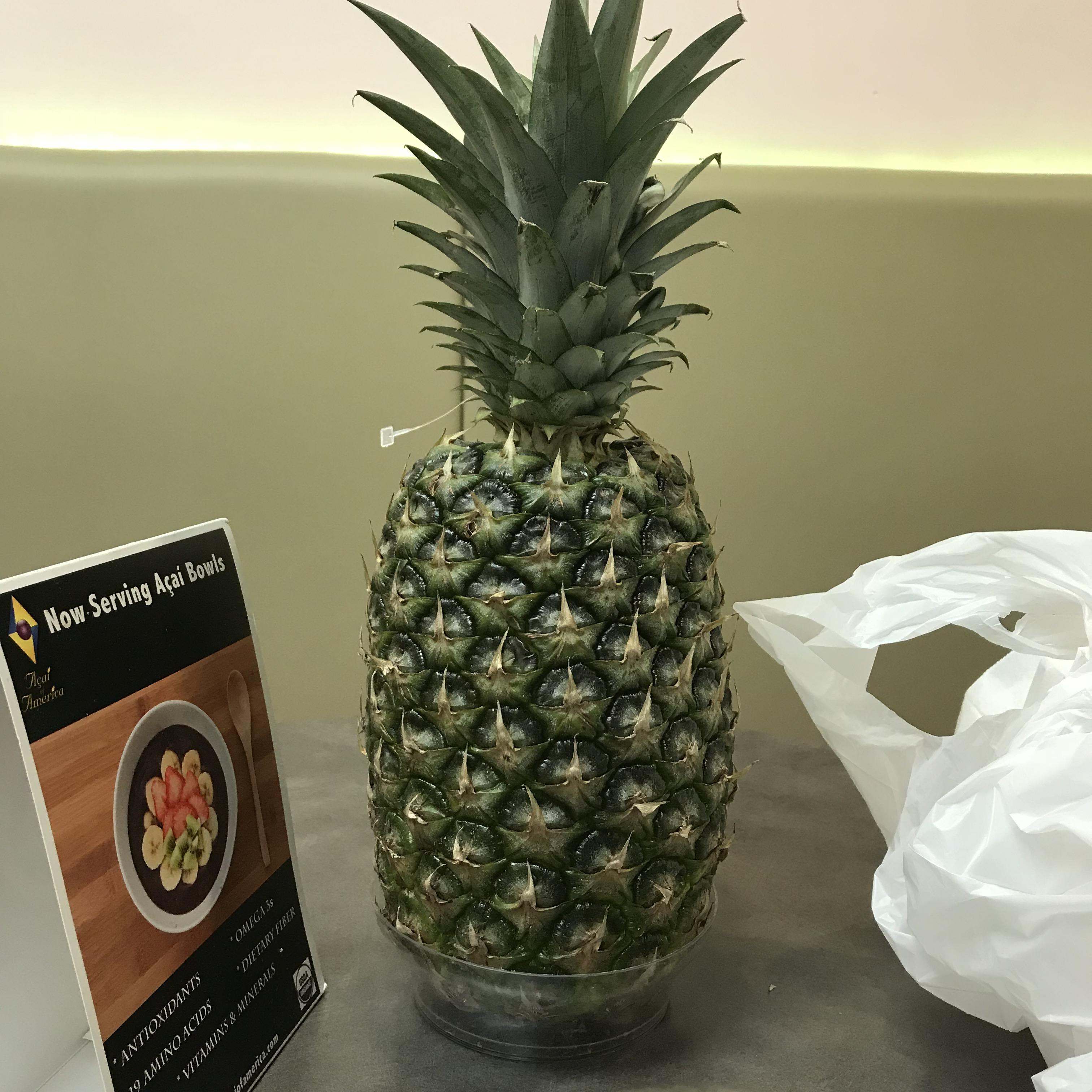 This cafe uses plastic pineapples as centerpieces on every table r