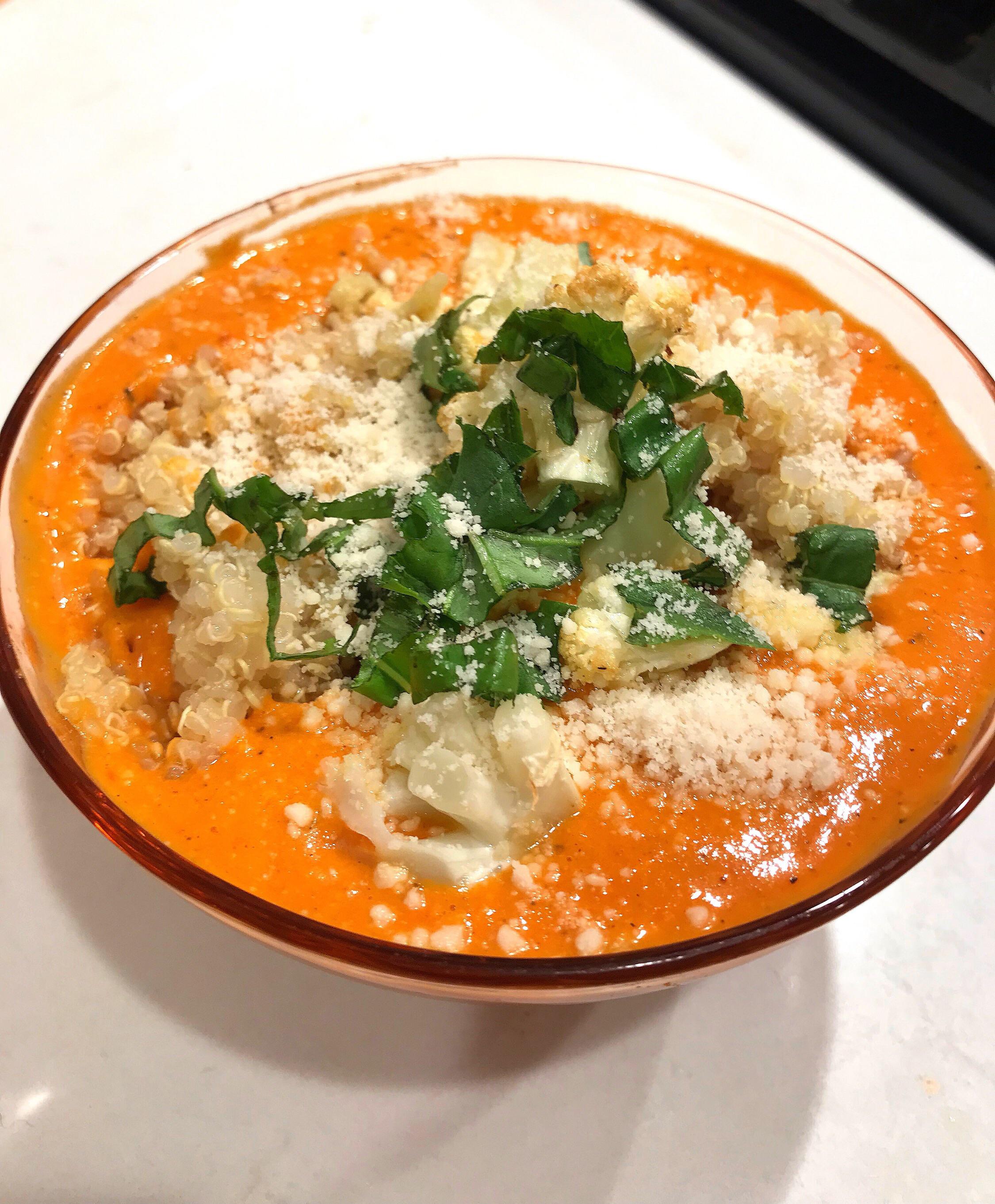 Coconut milk tomato bisque with quinoa, roasted cauliflower, basil and vegan Parmesan 🧡 r/vegan