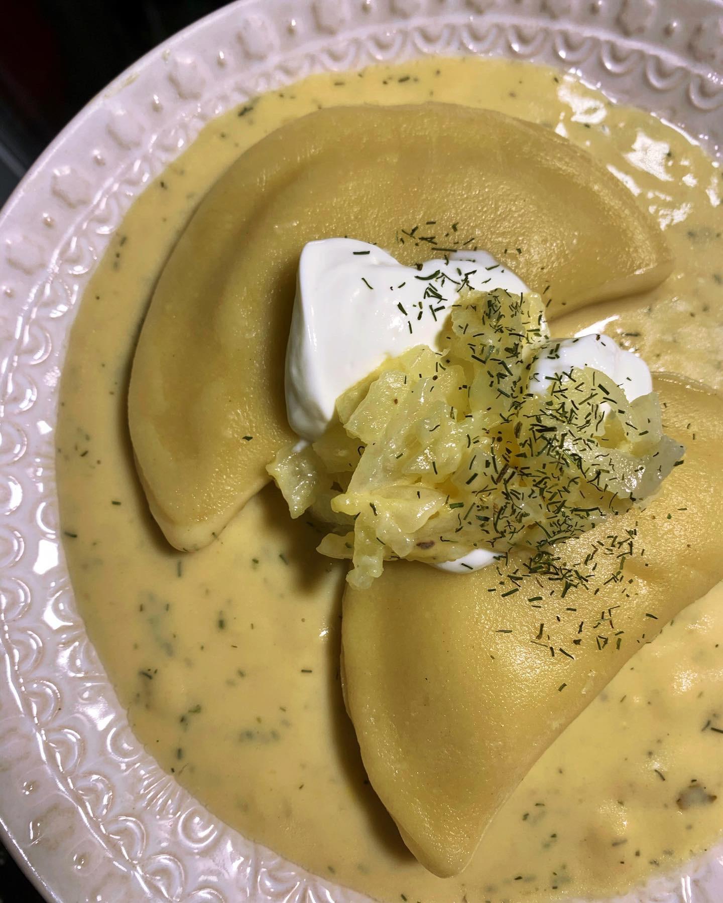[Homemade] cheese and potato perogies with dill cream sauce, sour cream, and buttered onions r