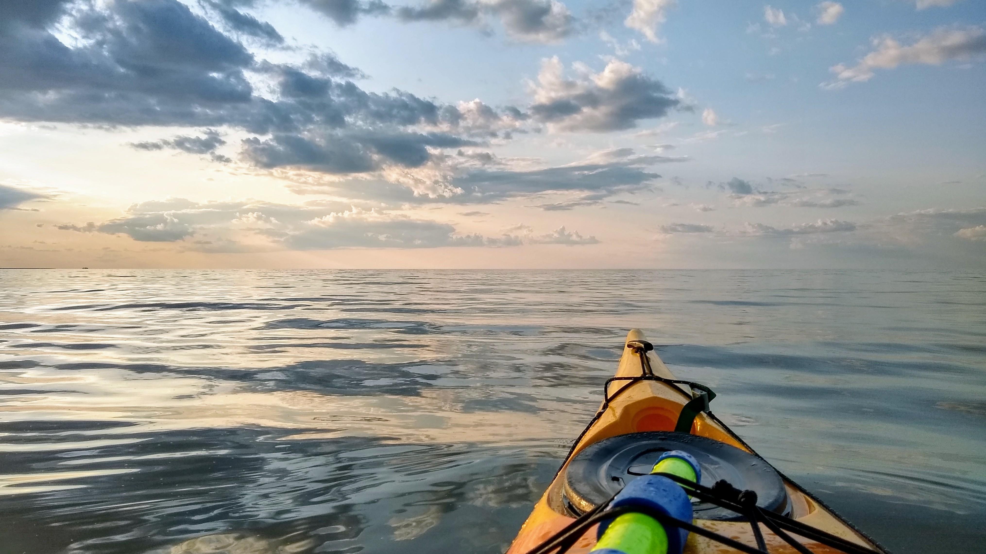 Lake Huron in the evening. The glassy reflective swells gave the sensation of gliding on a sea