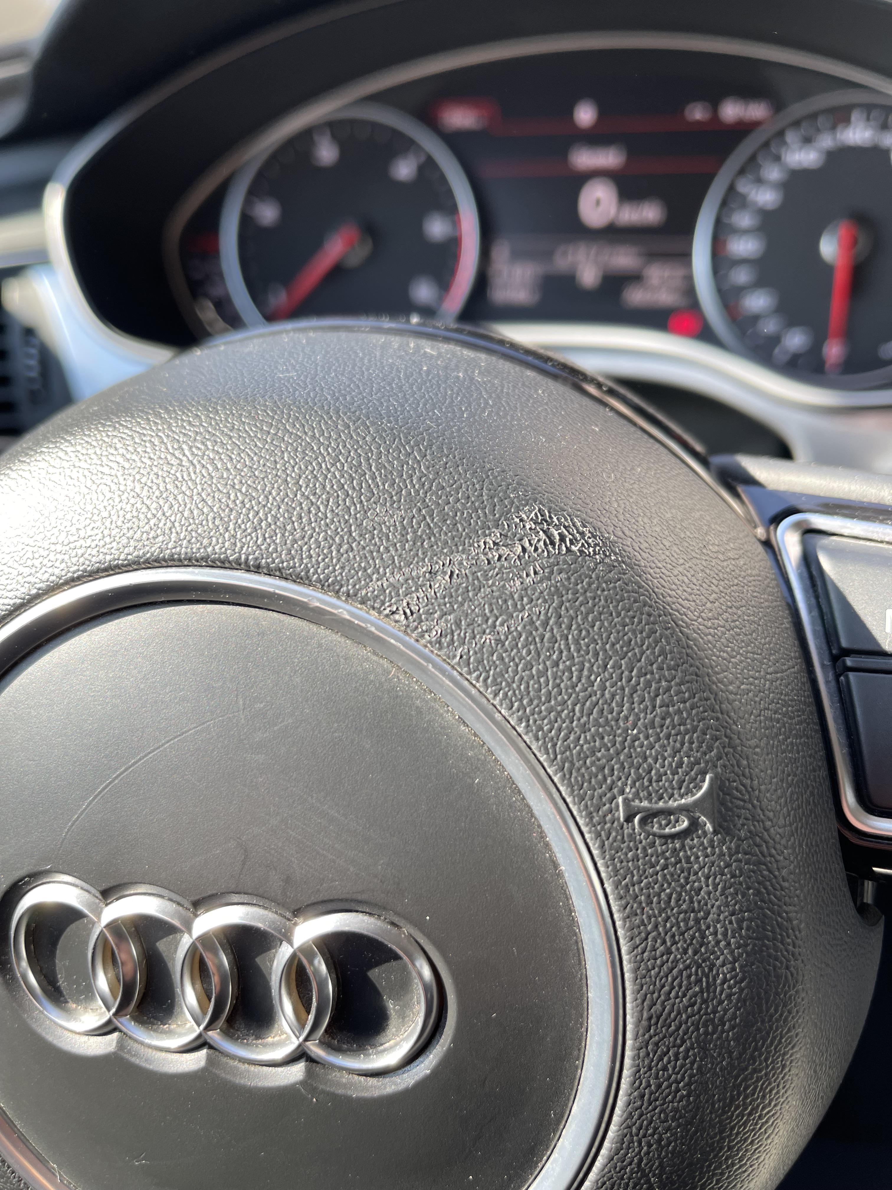 Any idea how to remove this scratch from my steering wheel? r/Audi