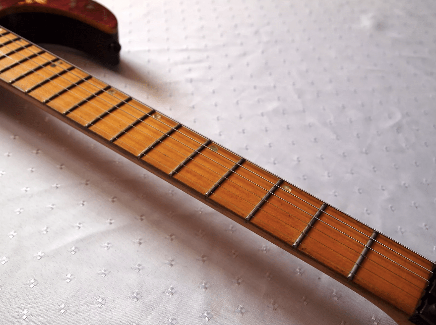Is there a way I can darken a maple fretboard to something like this