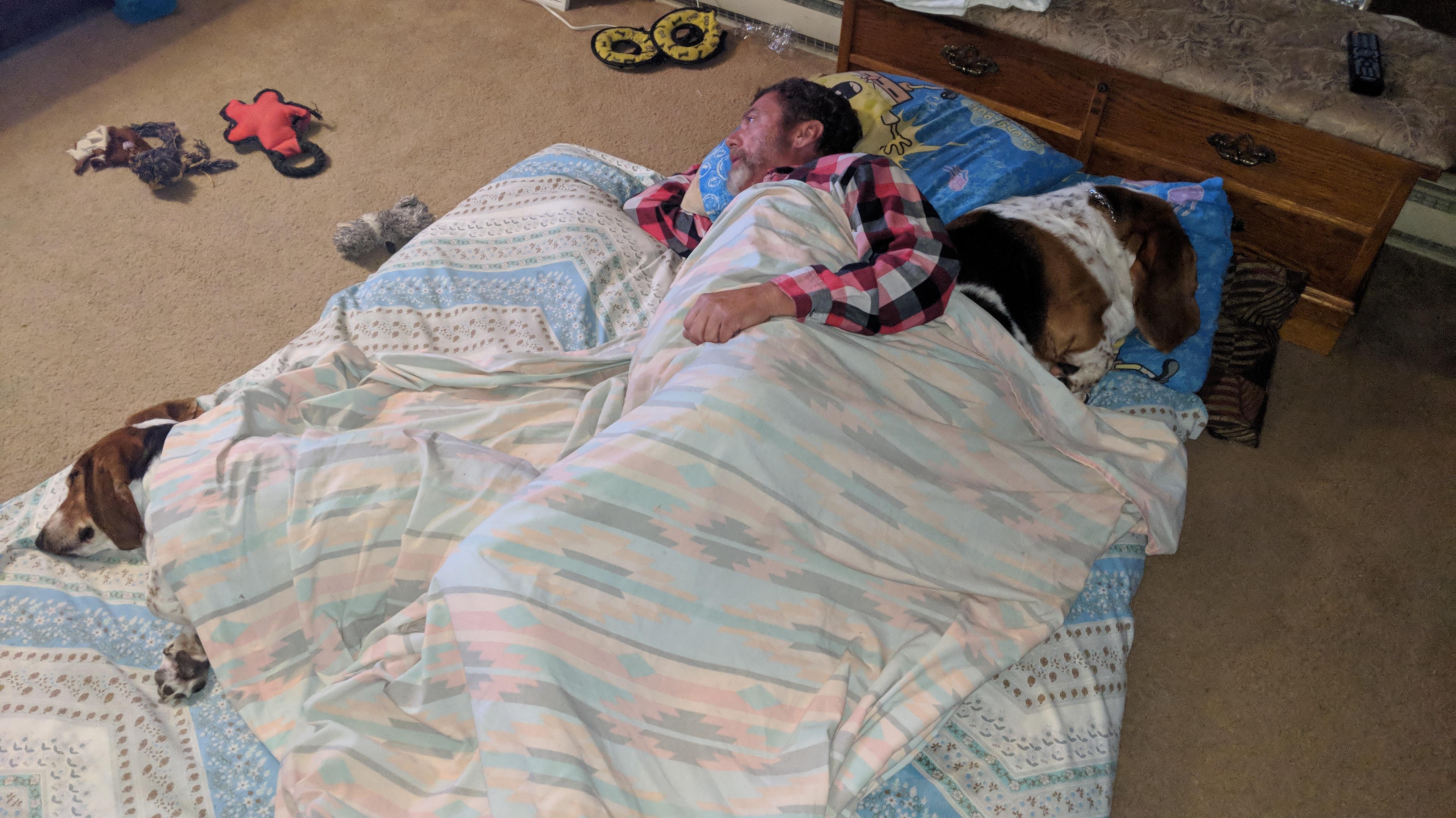 The Blanket Monster has three heads, twleve limbs, and lots of love