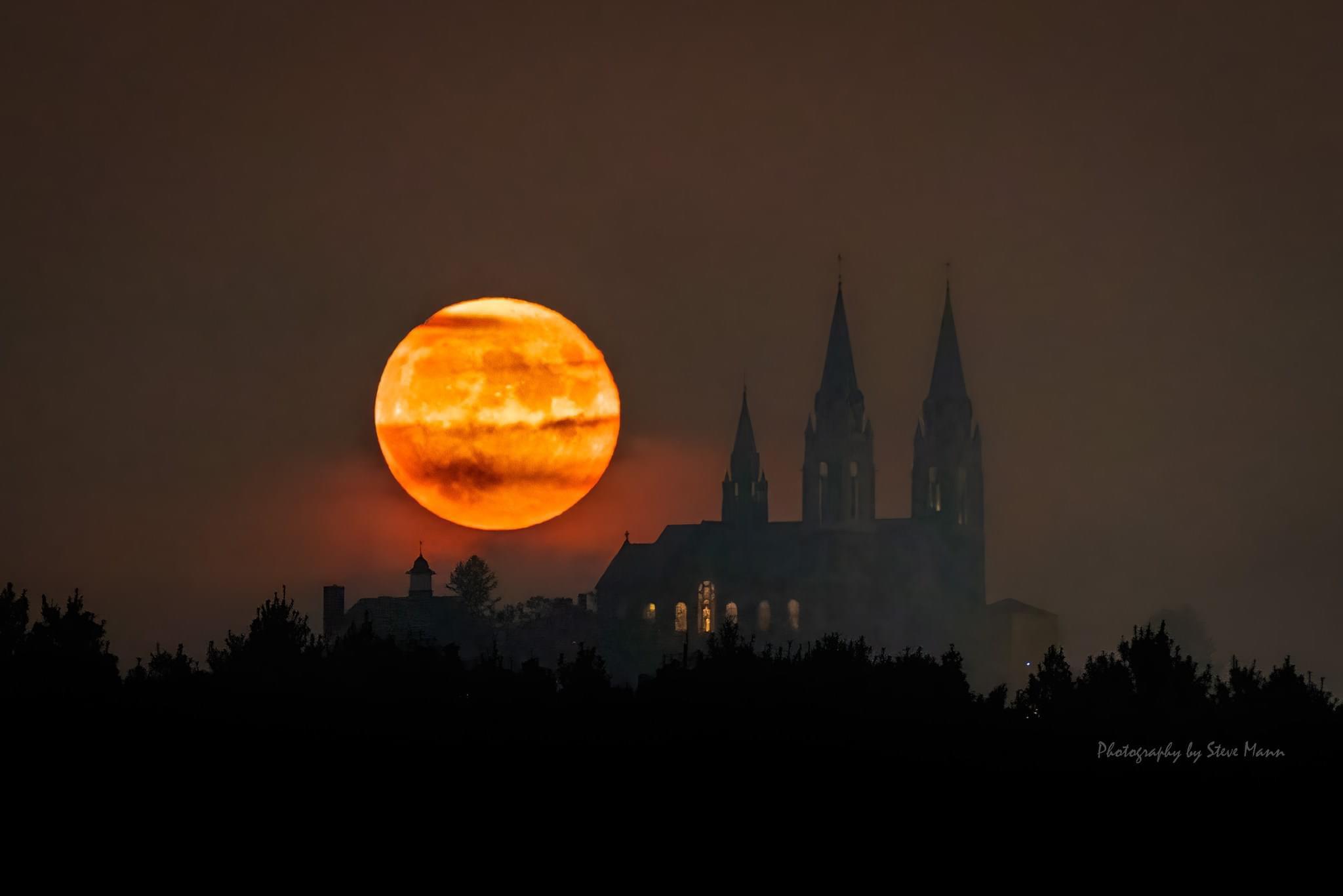 🔥 the harvest moon rising over Holy Hill Cathedral in Wisconsin r