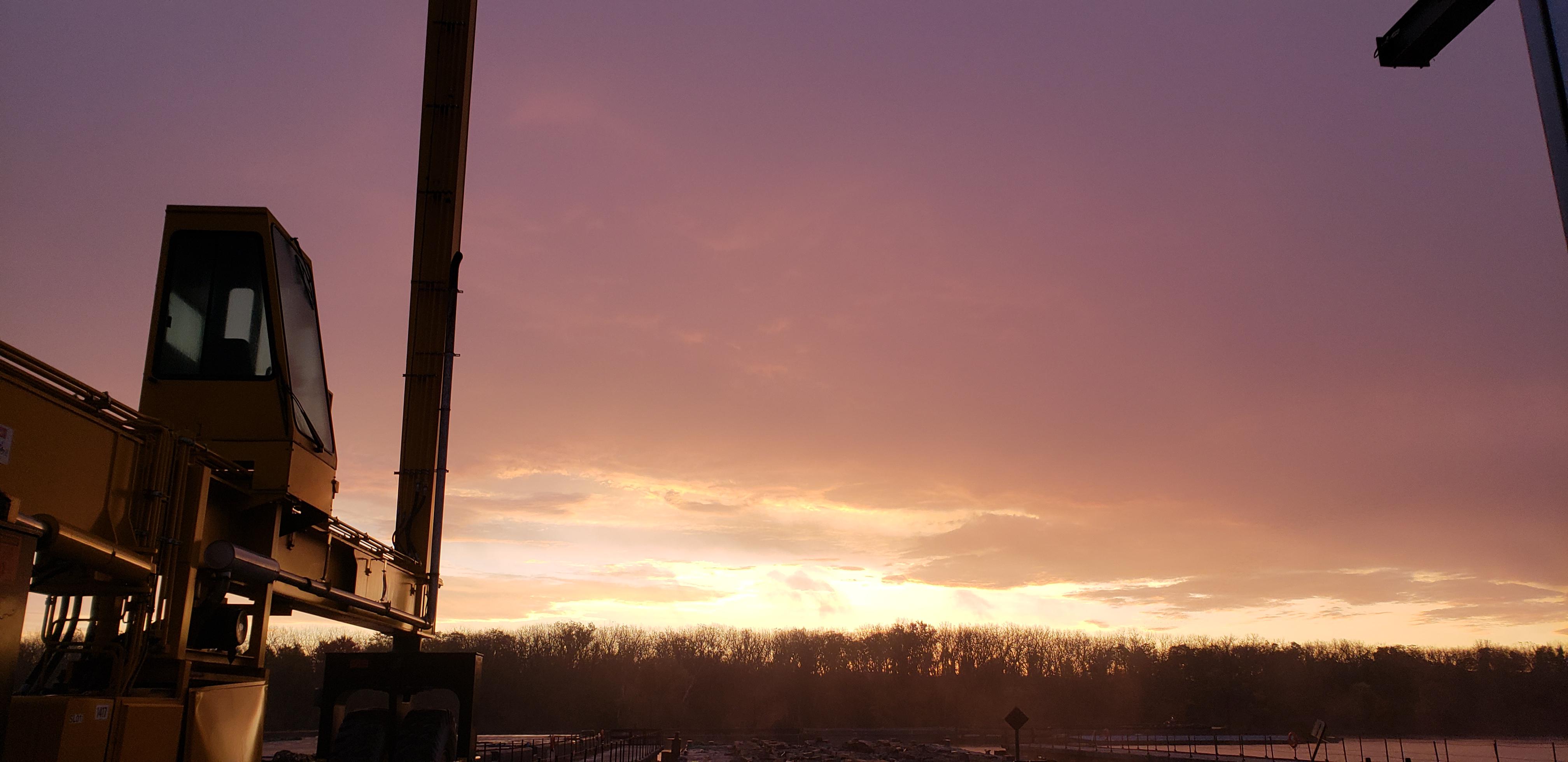 Sunrise under a crane. Hudson river, Coeymans, New York [4032x1960] [OC