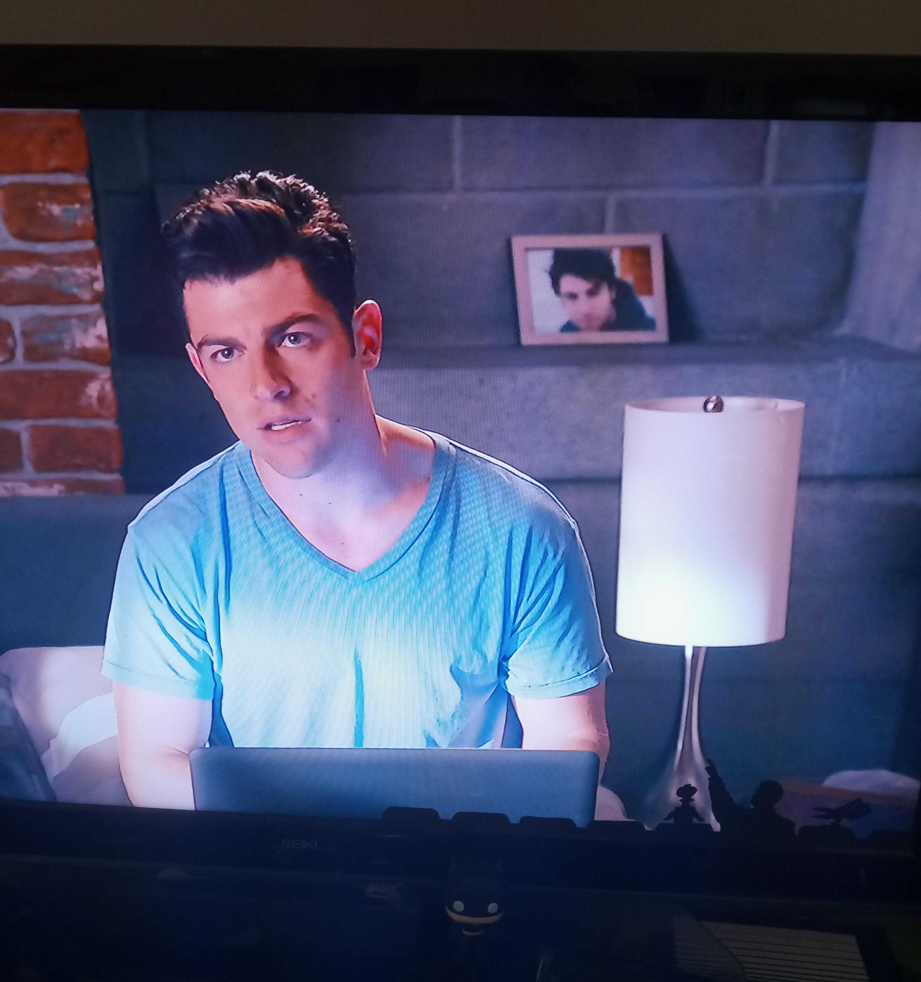 Who is in the picture behind Schmidt? It looks like Ian Somerhalder! 🤣