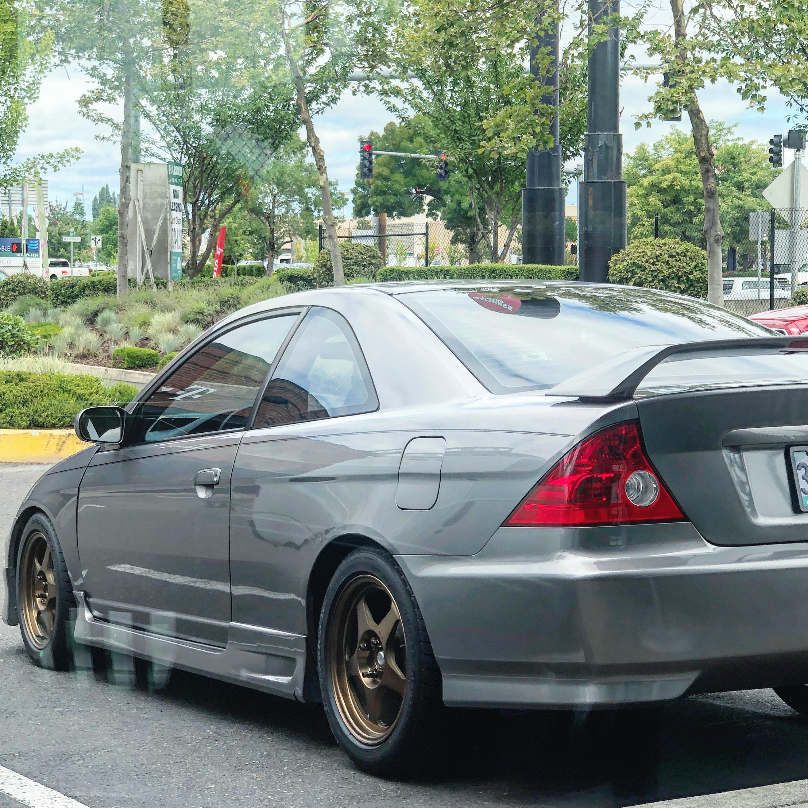 Honda Civic 01 LX. Listen closely.. hopefully you can hear it but there