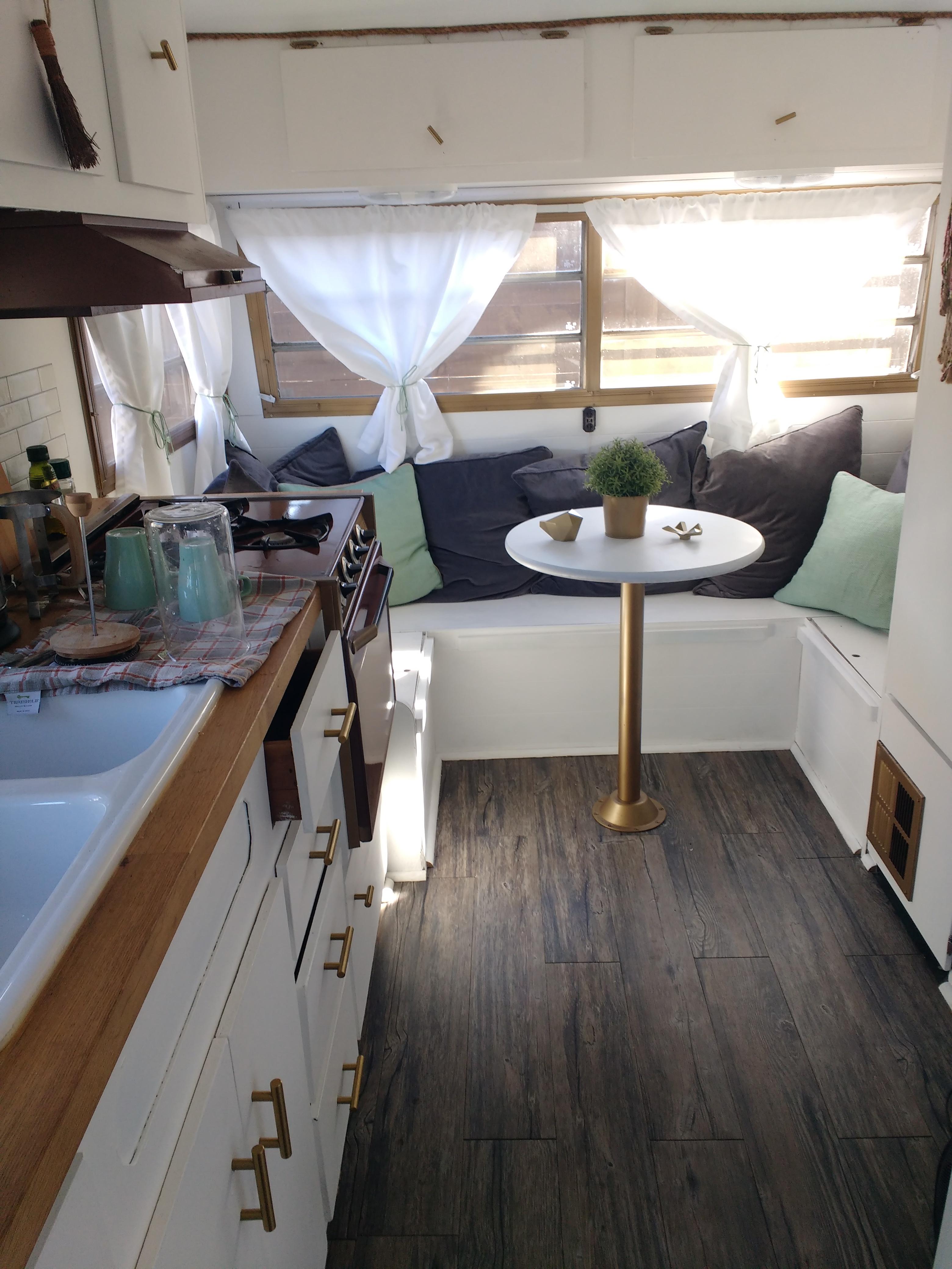 Cute trailer with a perfect spot for morning coffee r/CozyPlaces