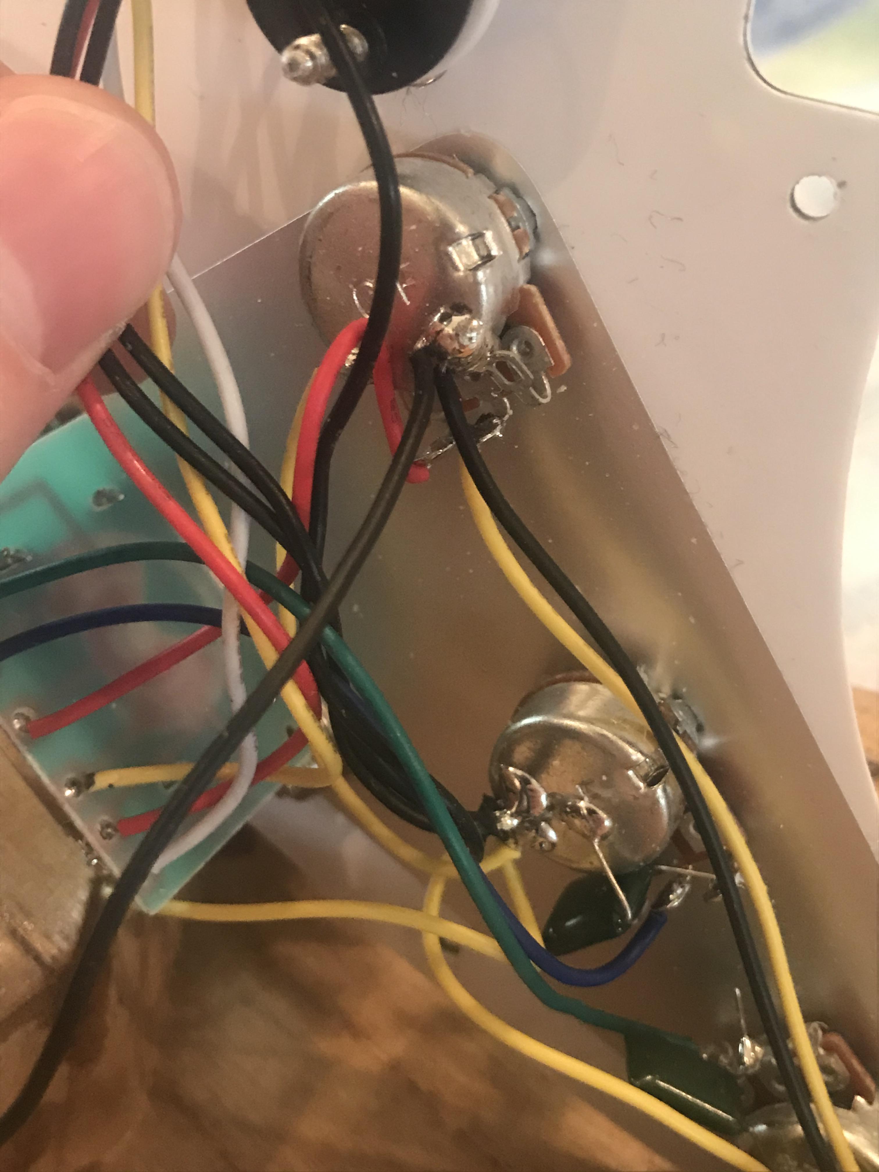 Does it matter which black wire is the ground? Getting a loud buzz that