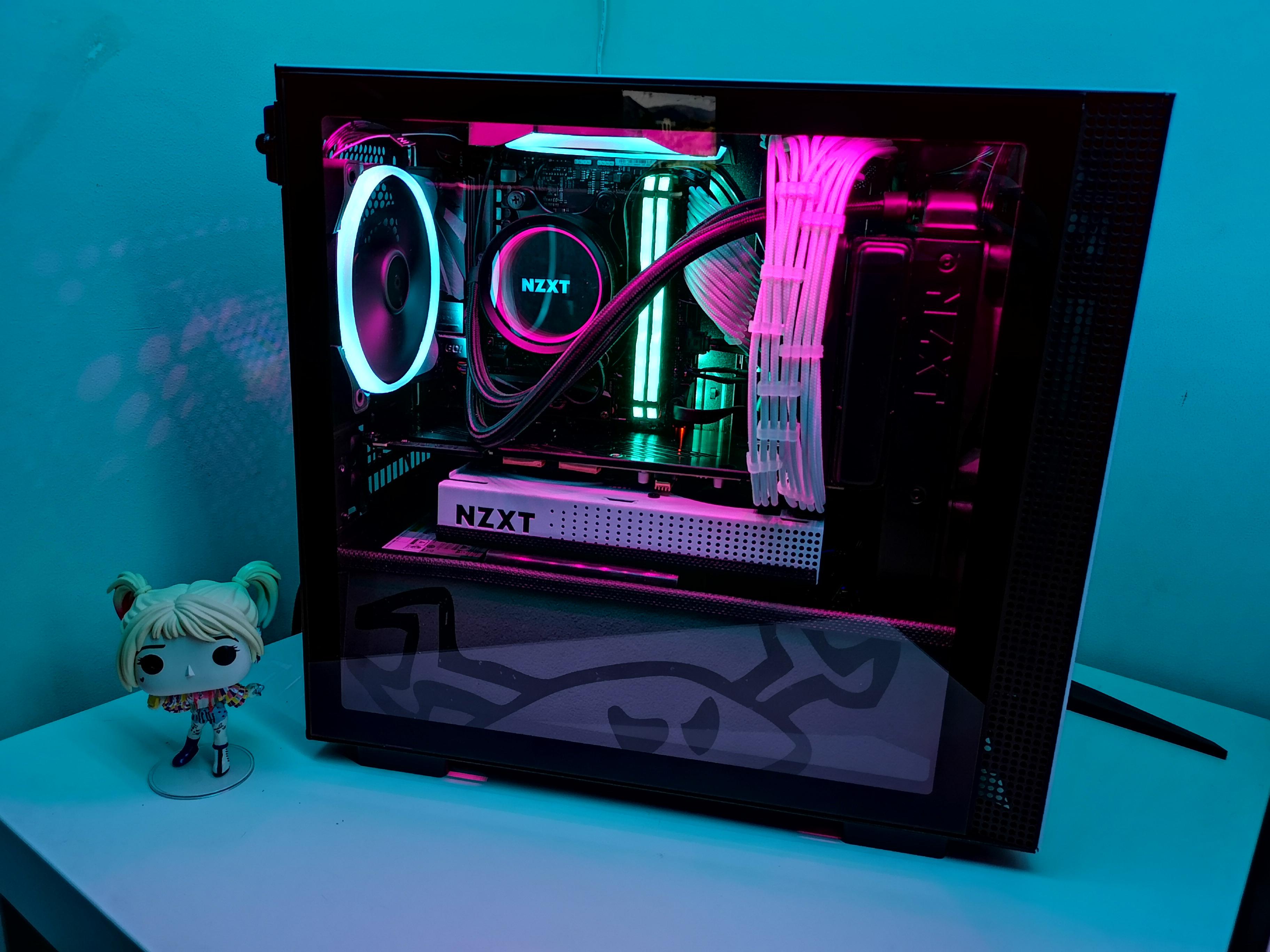 Squeezed dual CPU and GPU water cooling into an NZXT H210i, worth the