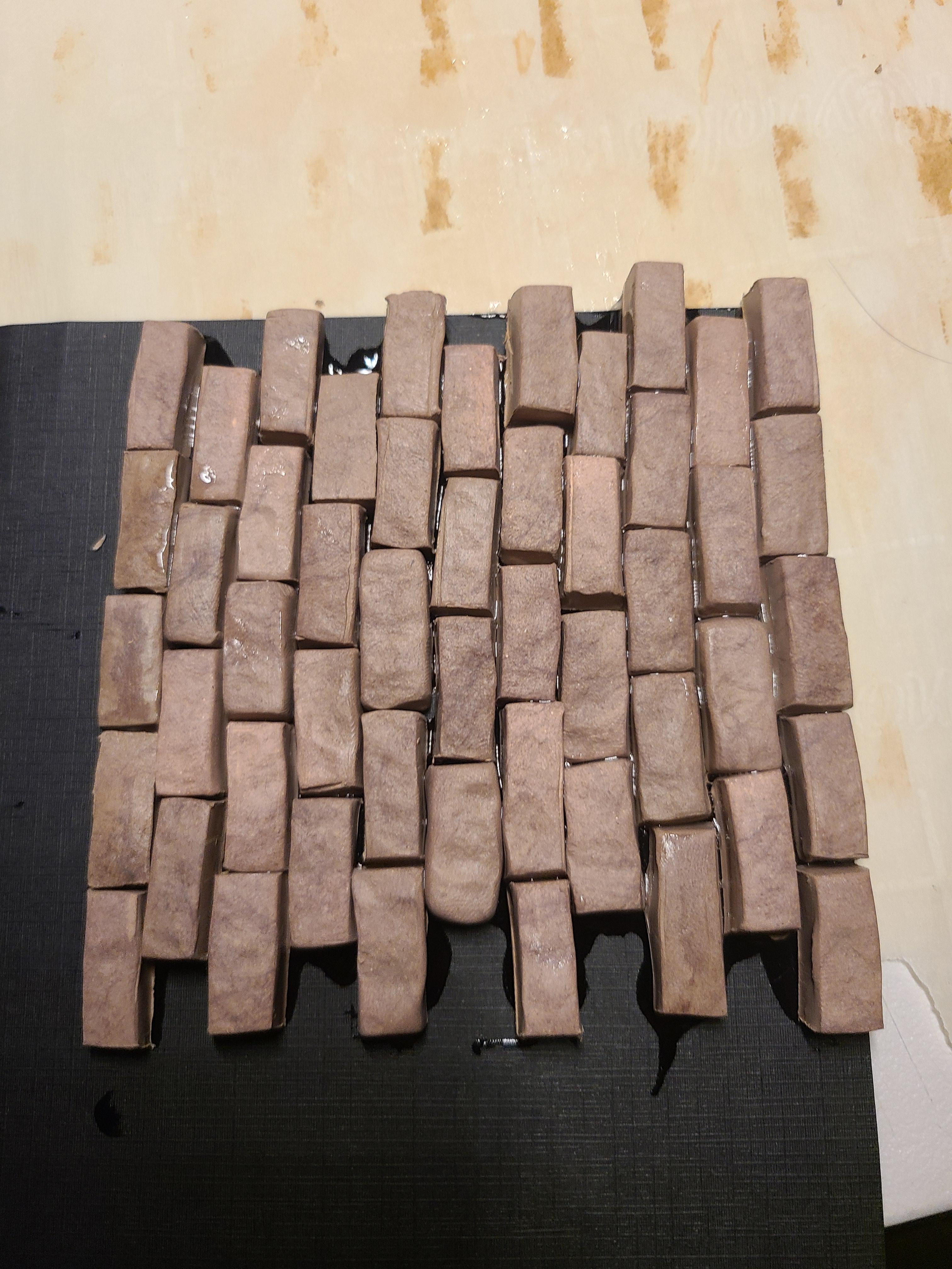 I cut, baked and glued bricks today but what should I use for a grout