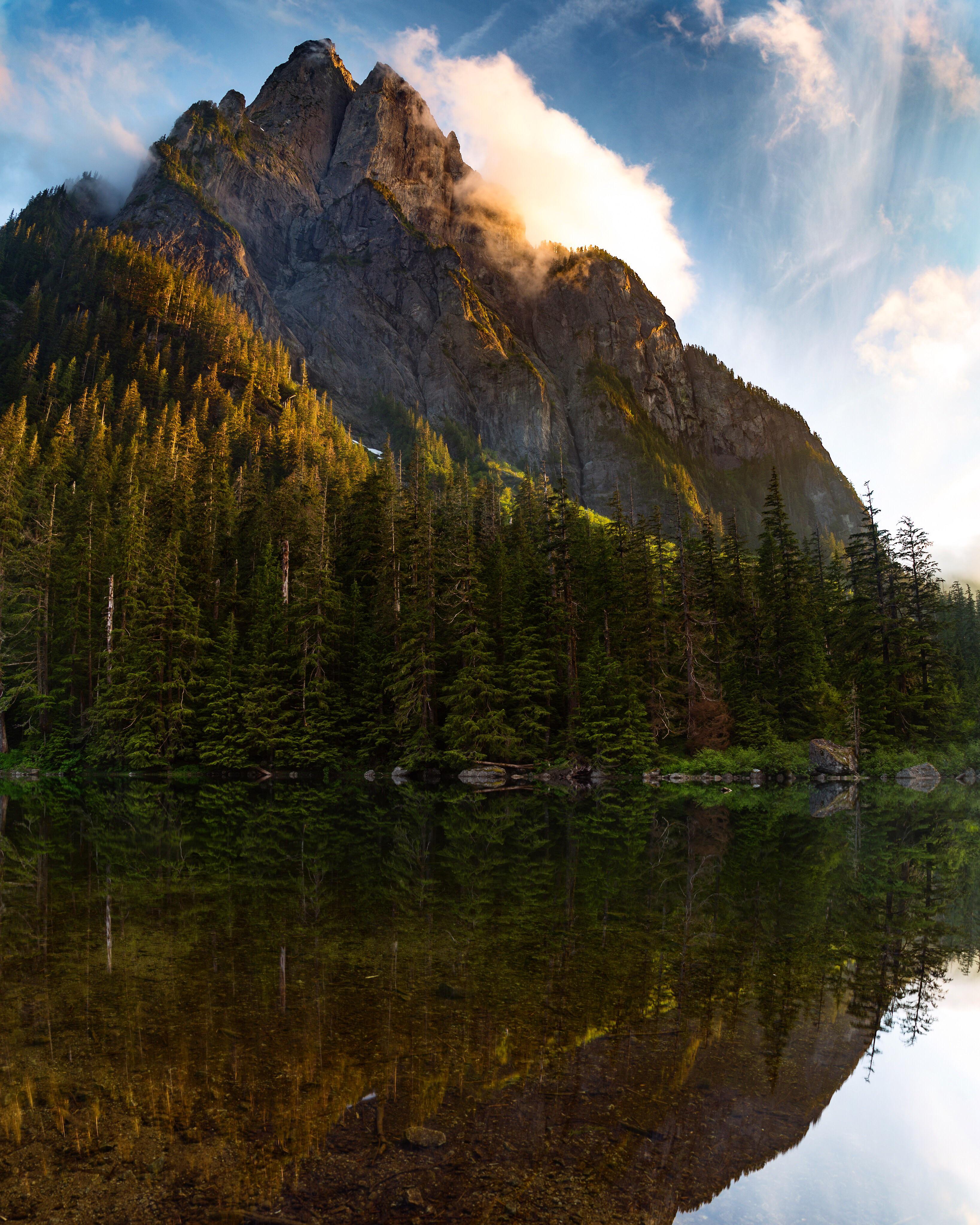 Baring mountain towering over Lake Barclay in Washington [OC
