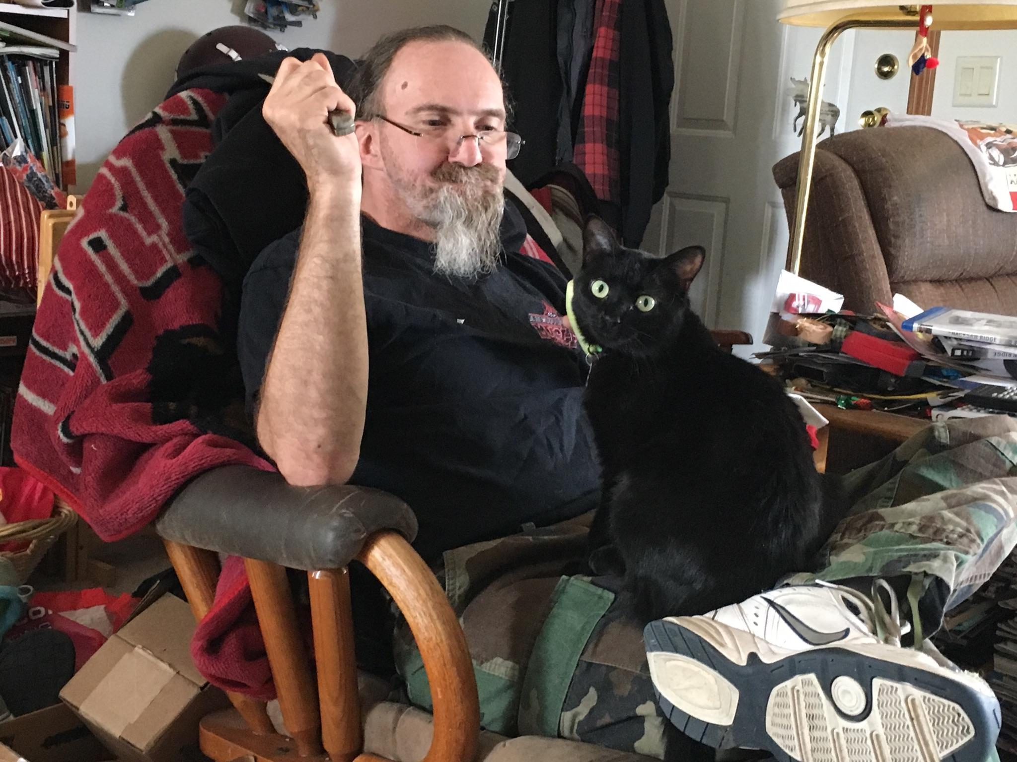 Just one of "his" cats. I have 3 cats currently living with my parents for their safety due to