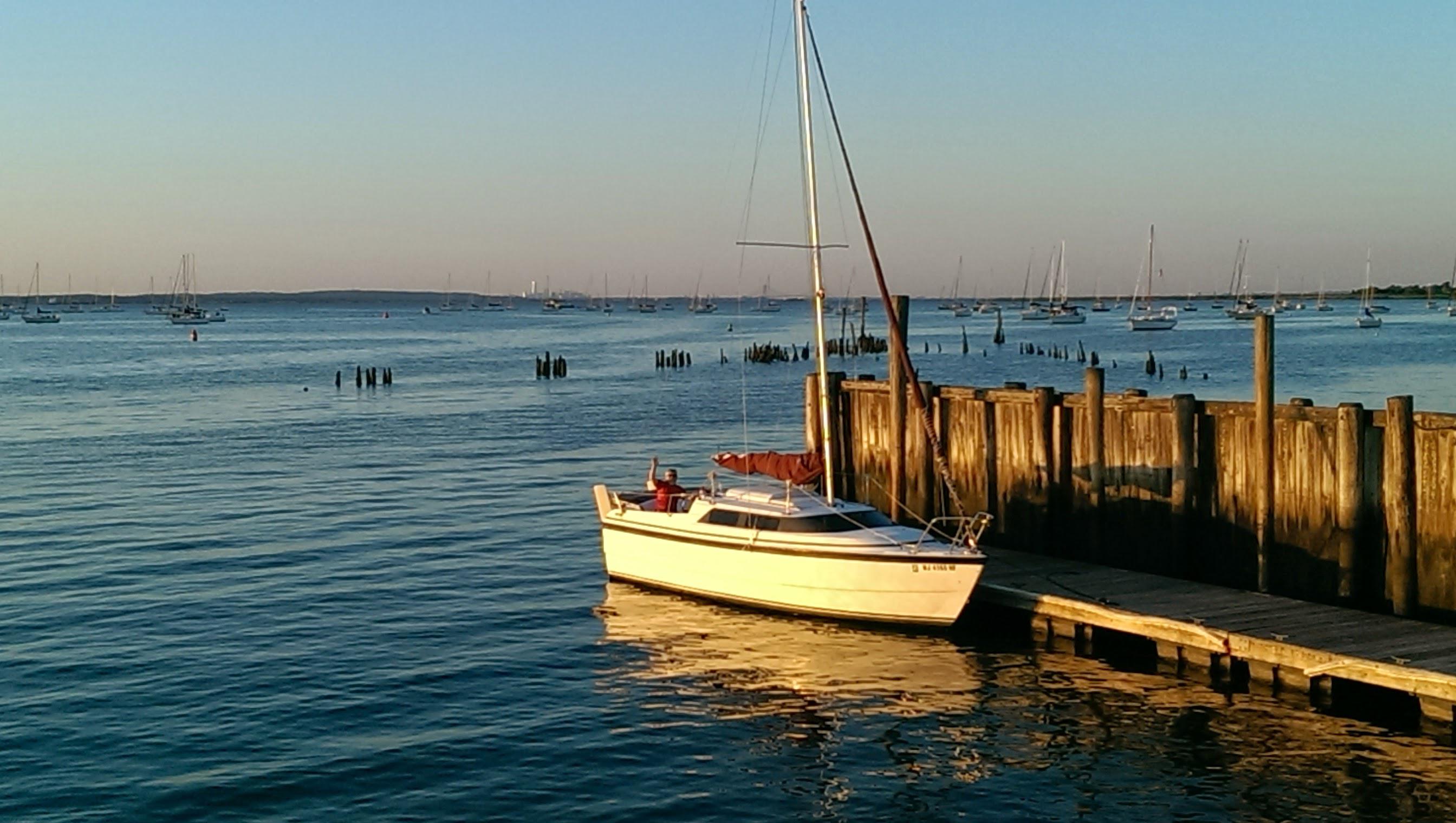 Beautiful evening at Keyport NJ with NYC in distance r/sailing