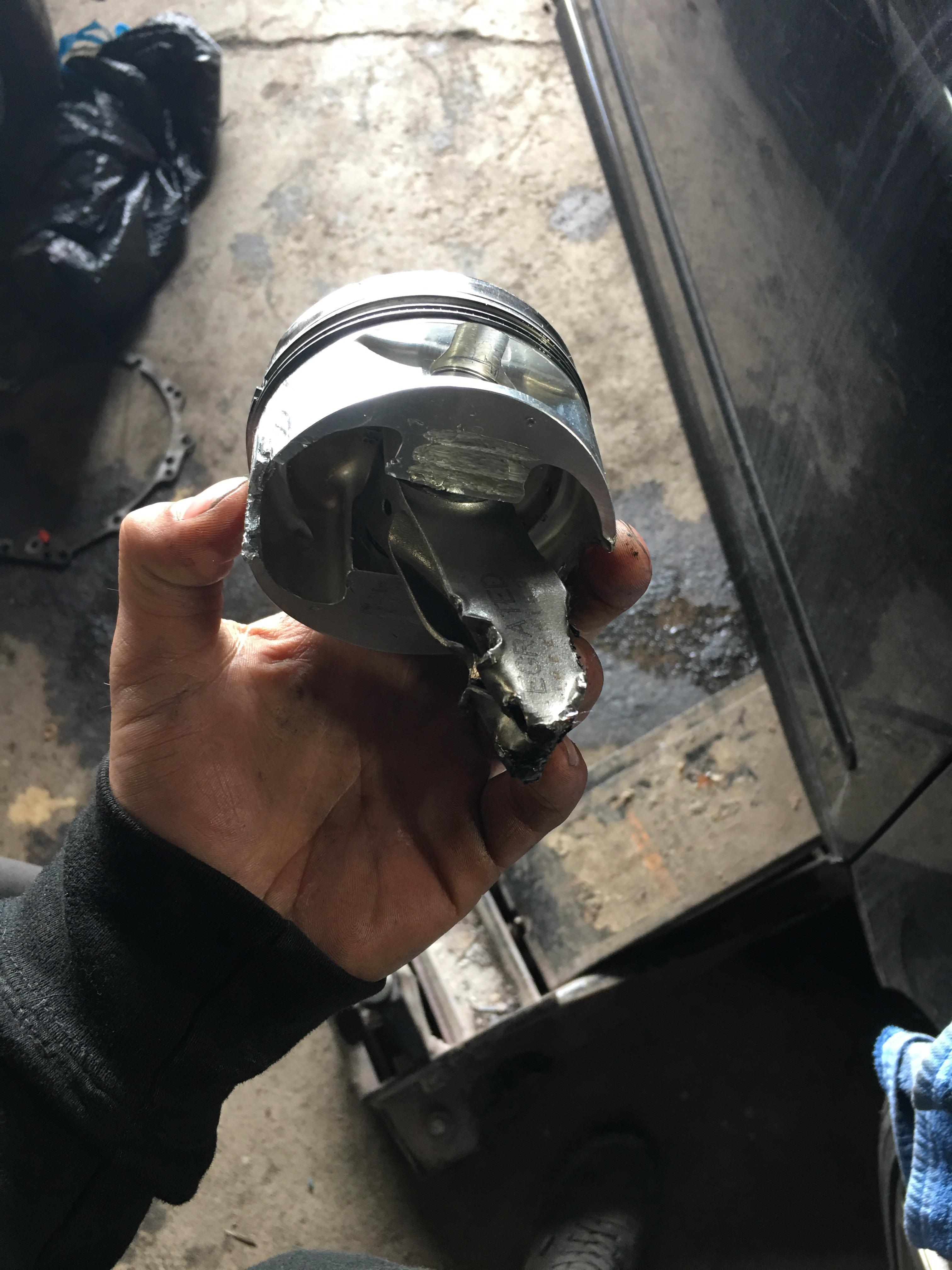 internals, injector stuck open. End result is this and a hole in