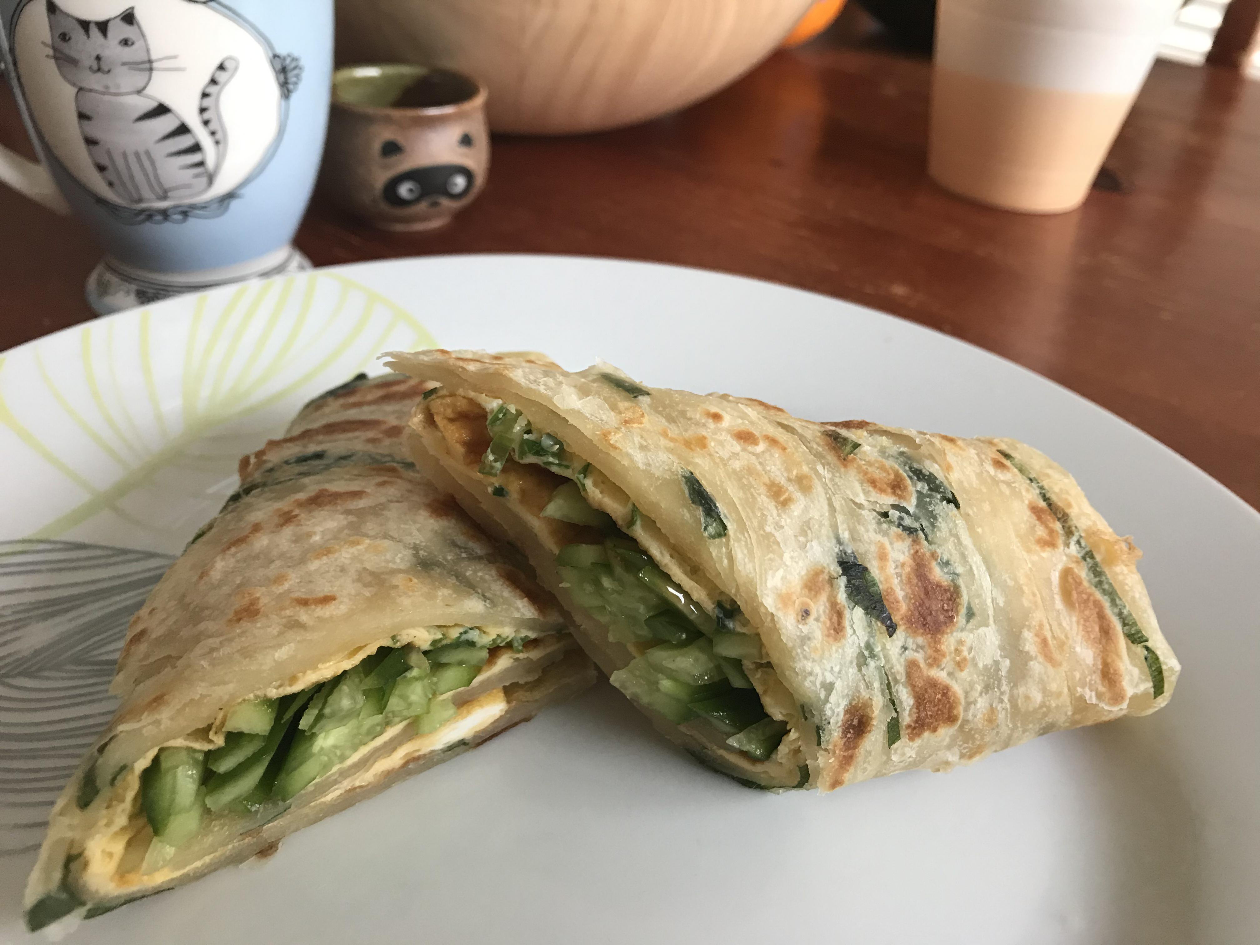 [Homemade] Scallion pancake with egg and cucumber brekkie wrap r/food