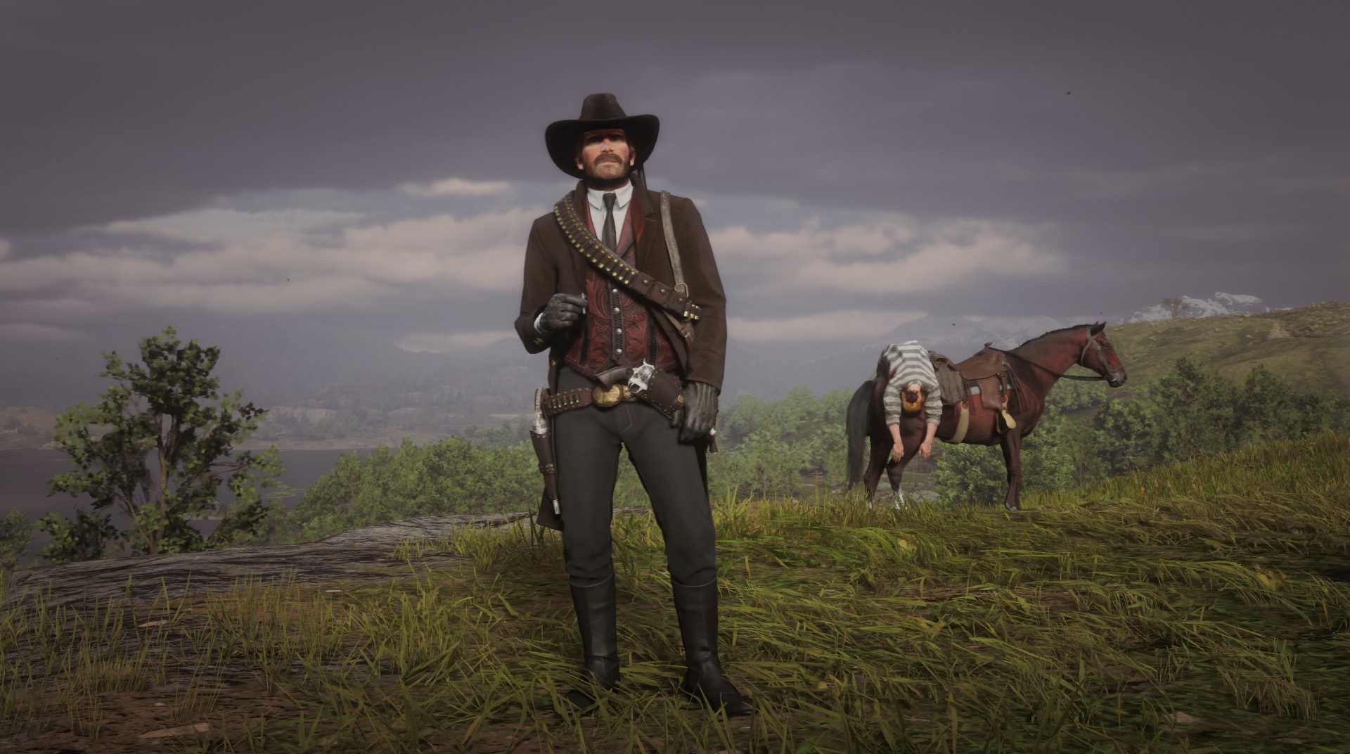 Arthur's new bounty hunter look, alongside his latest unfortunate