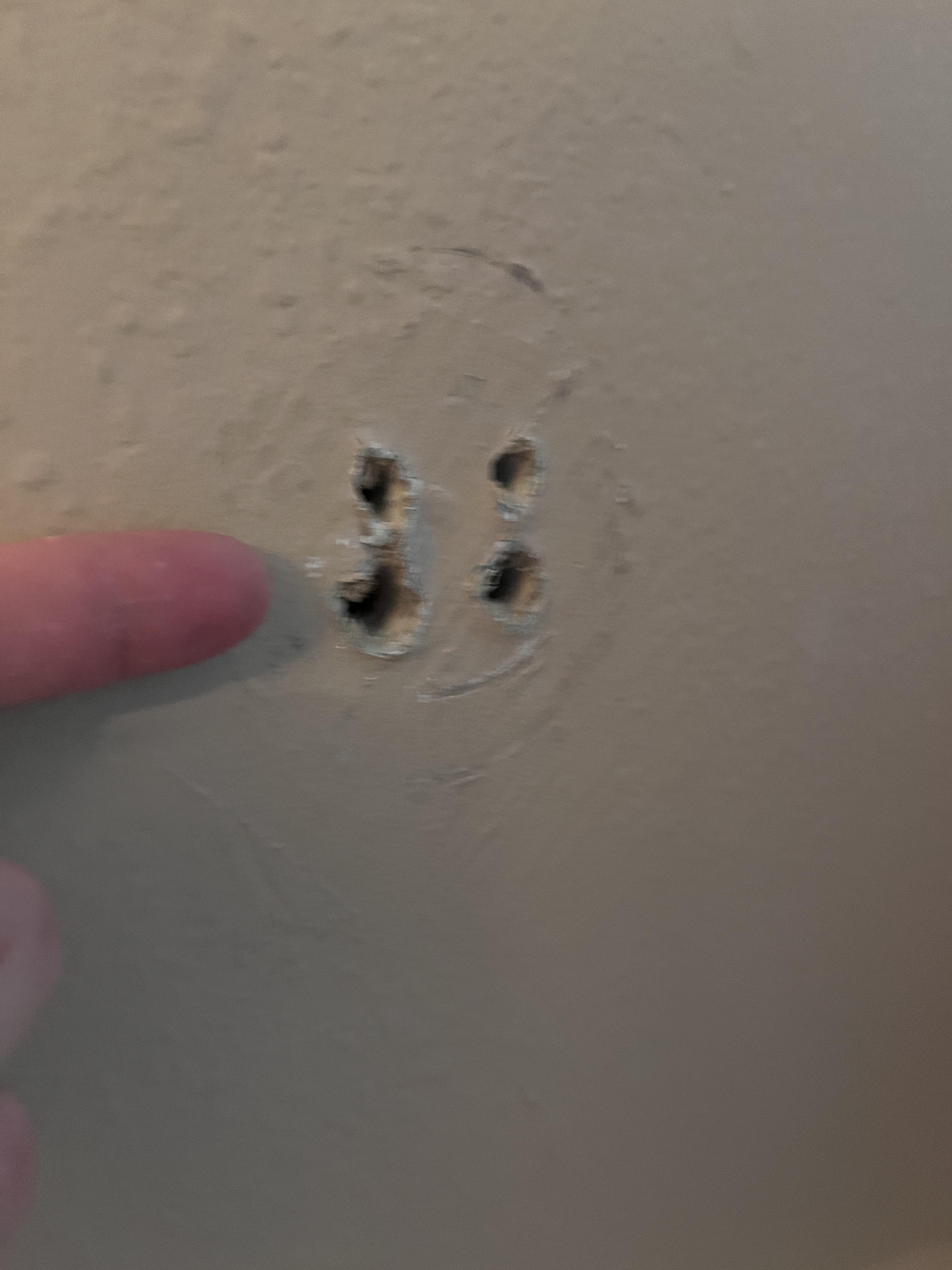 Previous homeowner attached towel bar to drywall that wasn’t strong