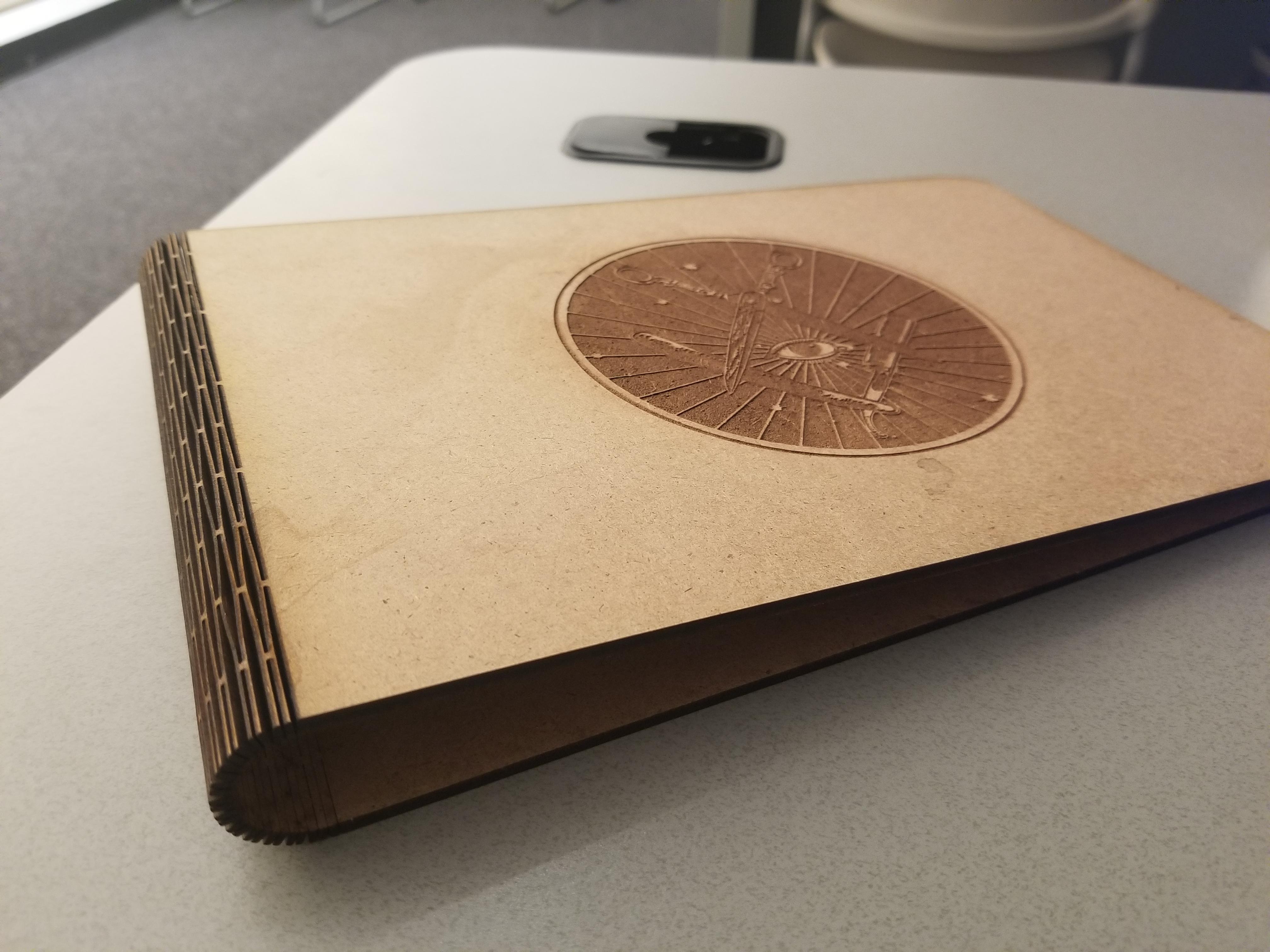 I made a laser cut despite book cover for a school project, any idea