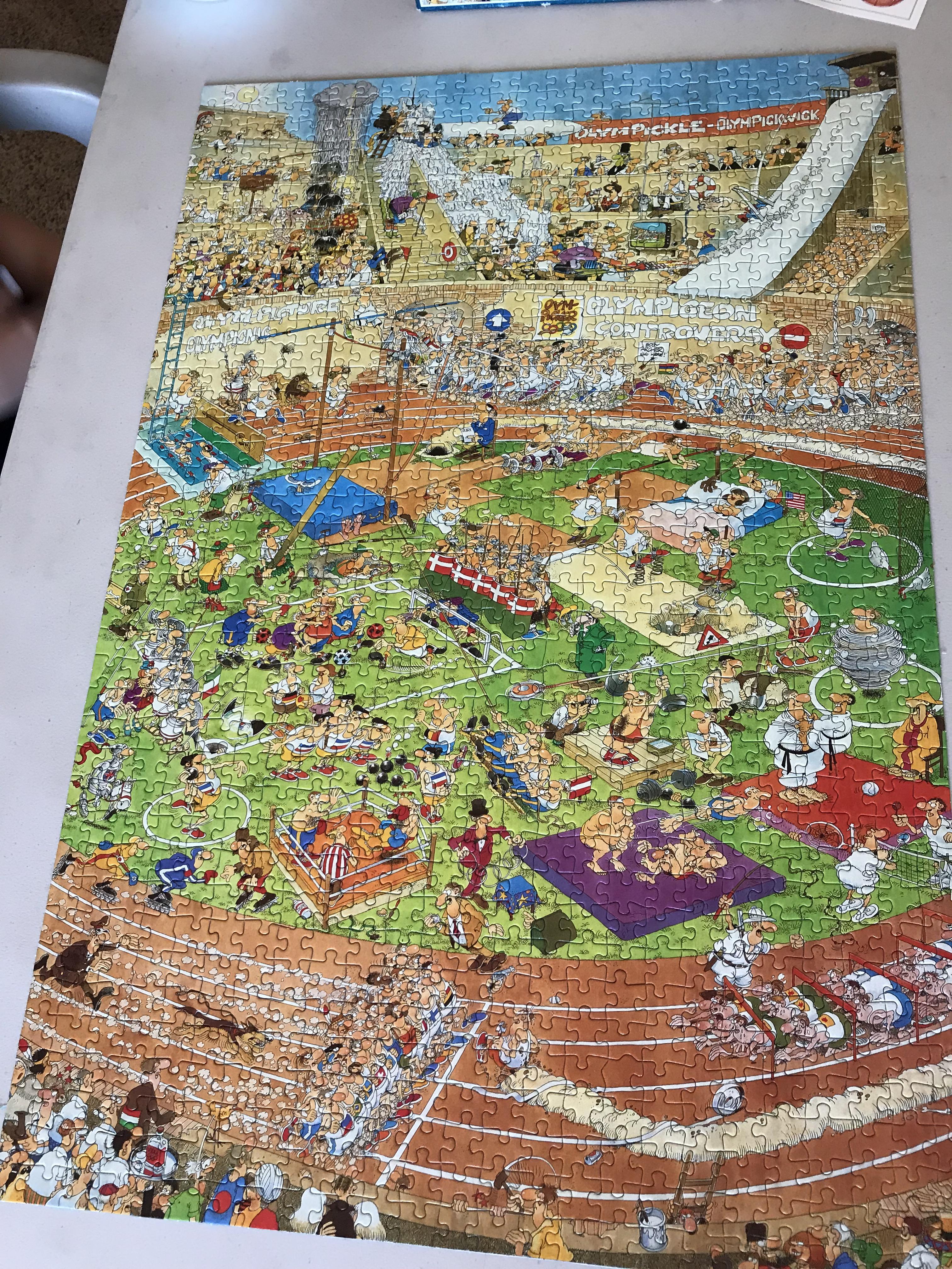 Olympics by Jan Van Haasteren (Jumbo 1,000 piece). Very fun puzzle with