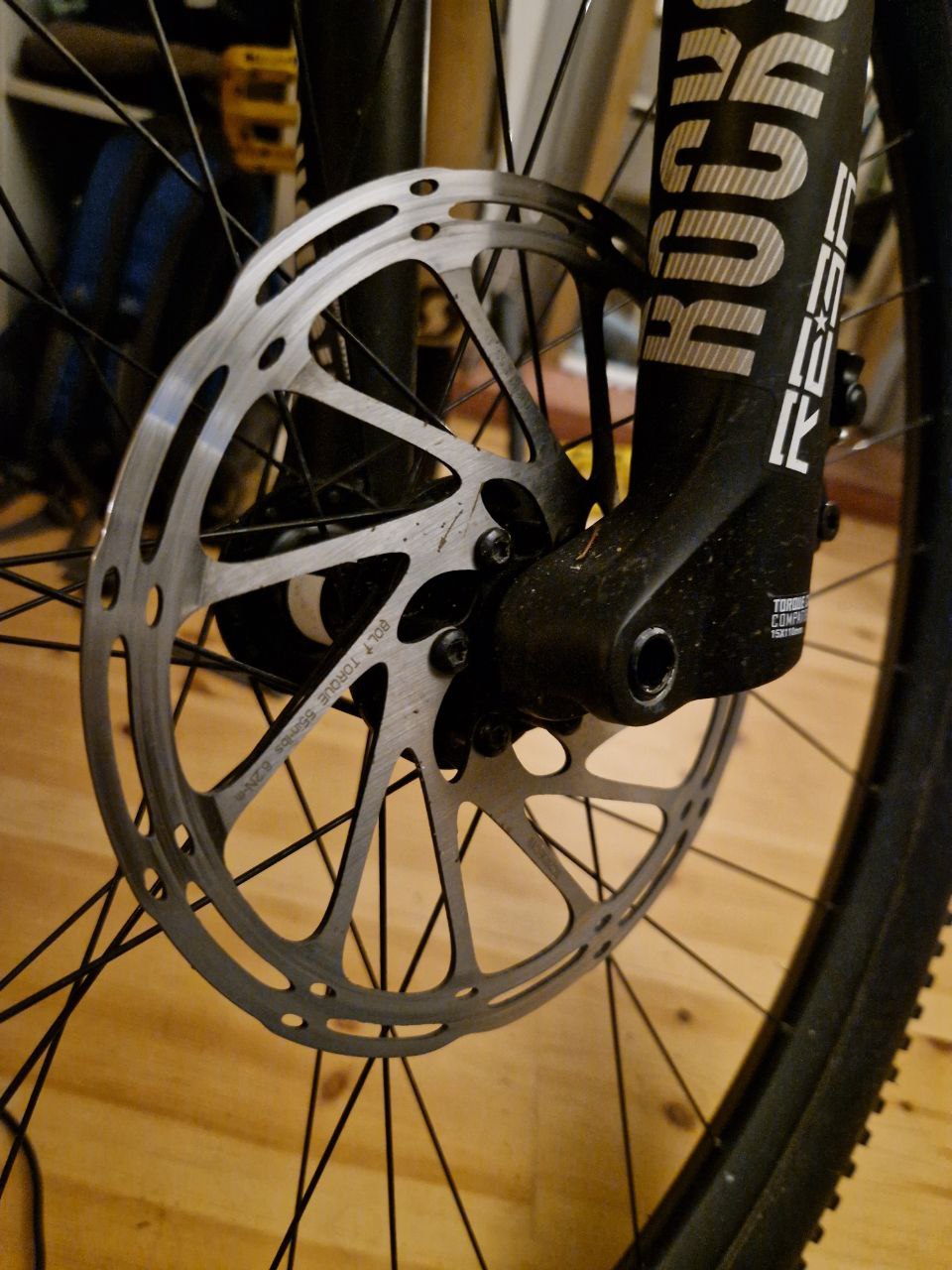 Are the brake pads rubbing too deep down the rotor? r/bikewrench