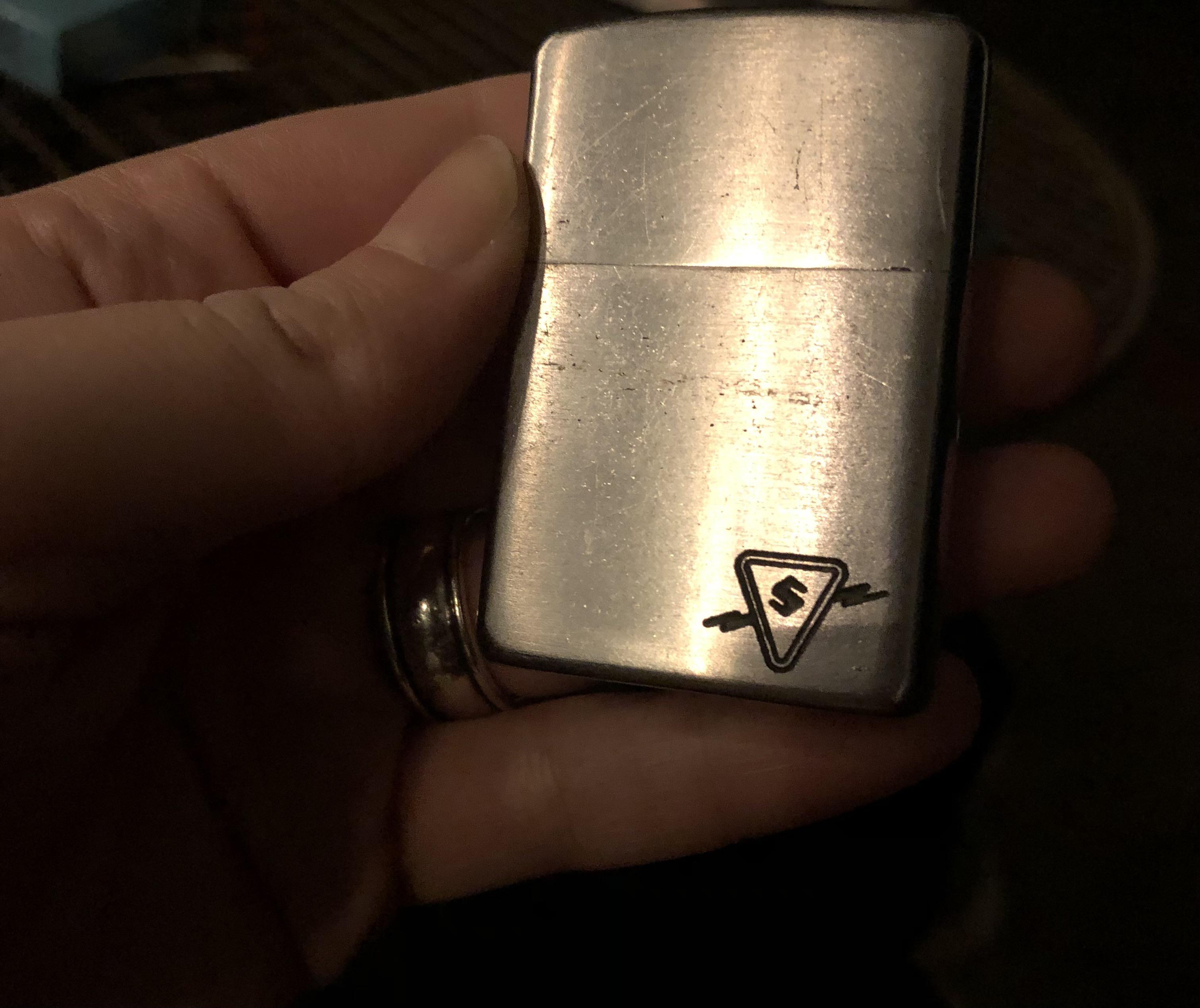 what is this upside down triangle with lightning and an S symbol? zippo