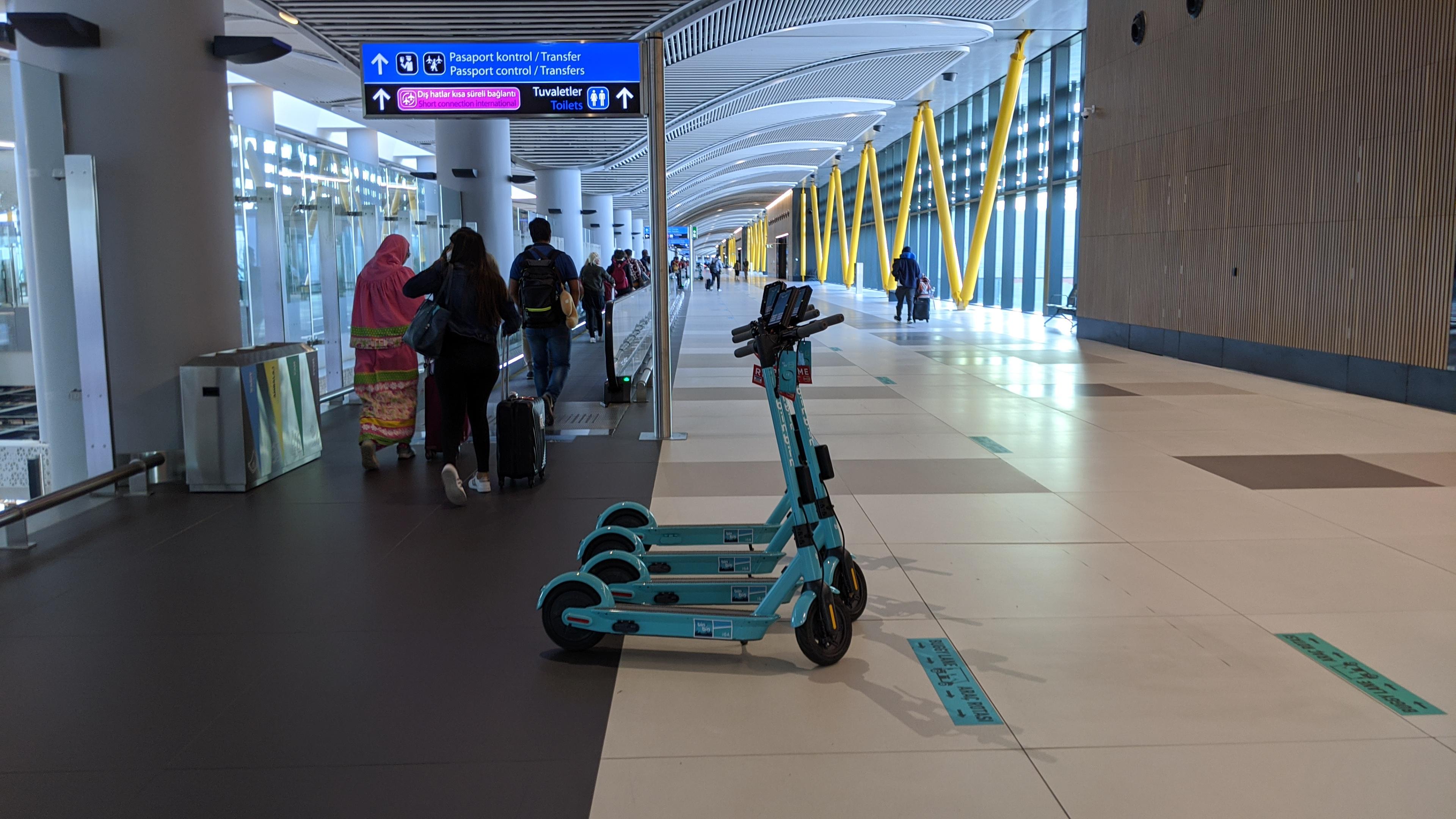 The Istanbul airport is so big they have scooters you can rent to