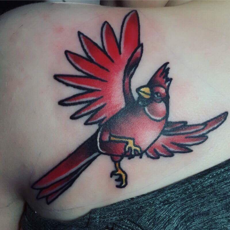 Cardinal tattoo done By Kim Gallegos at Hang em High in Odessa, Texas