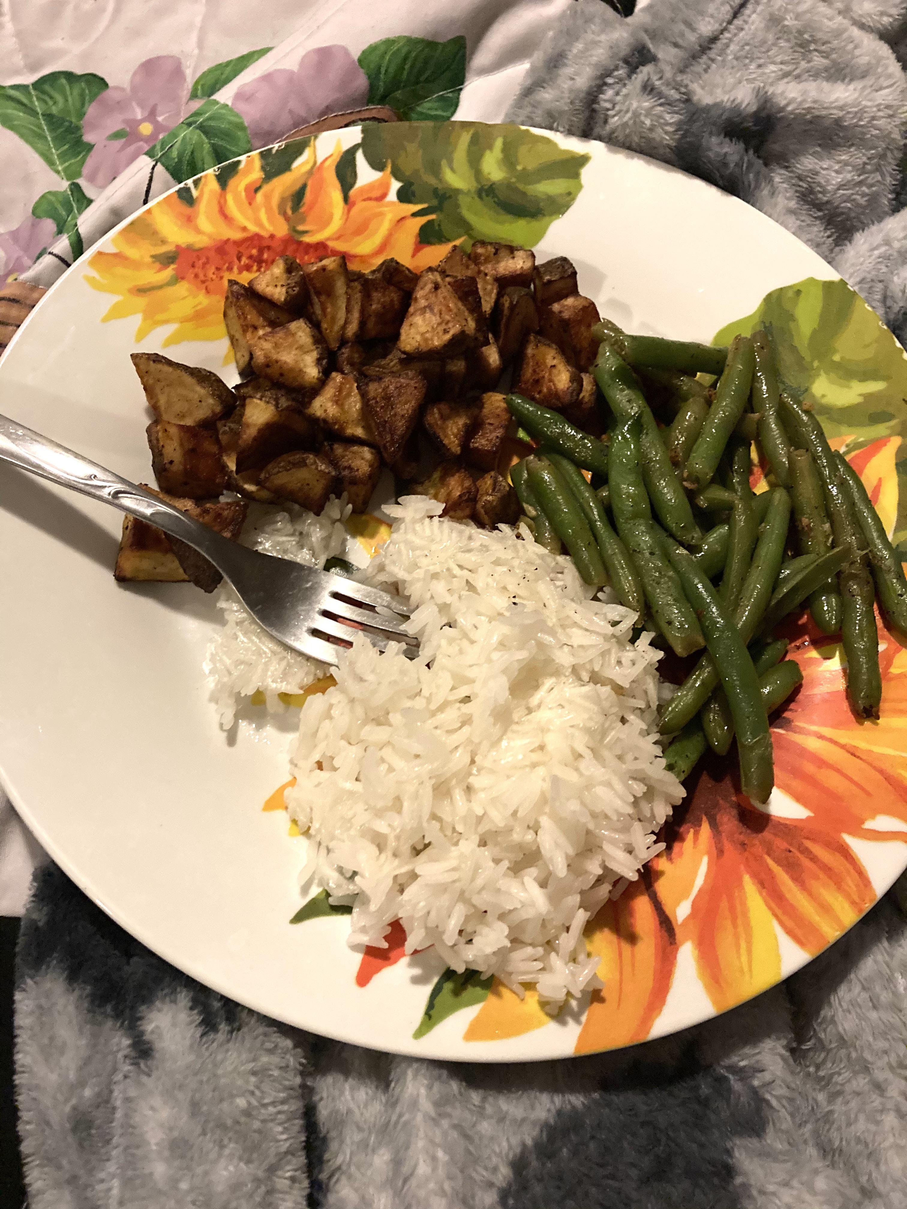 Green beans, rice, and rock hard (overcooked) potatoes. r/shittyfoodporn