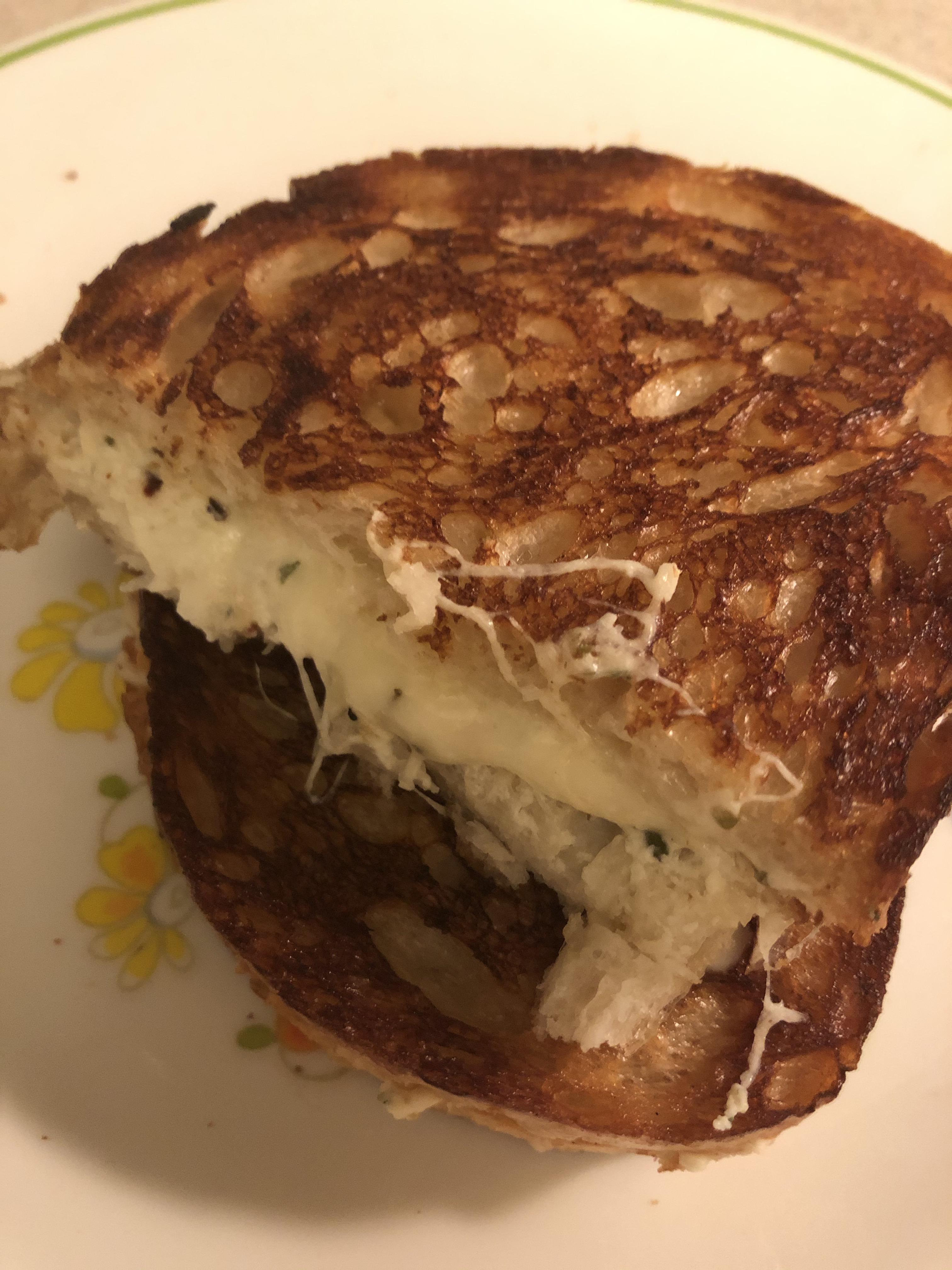 White grilled cheese with ricotta, Parmesan, and mozzarella on
