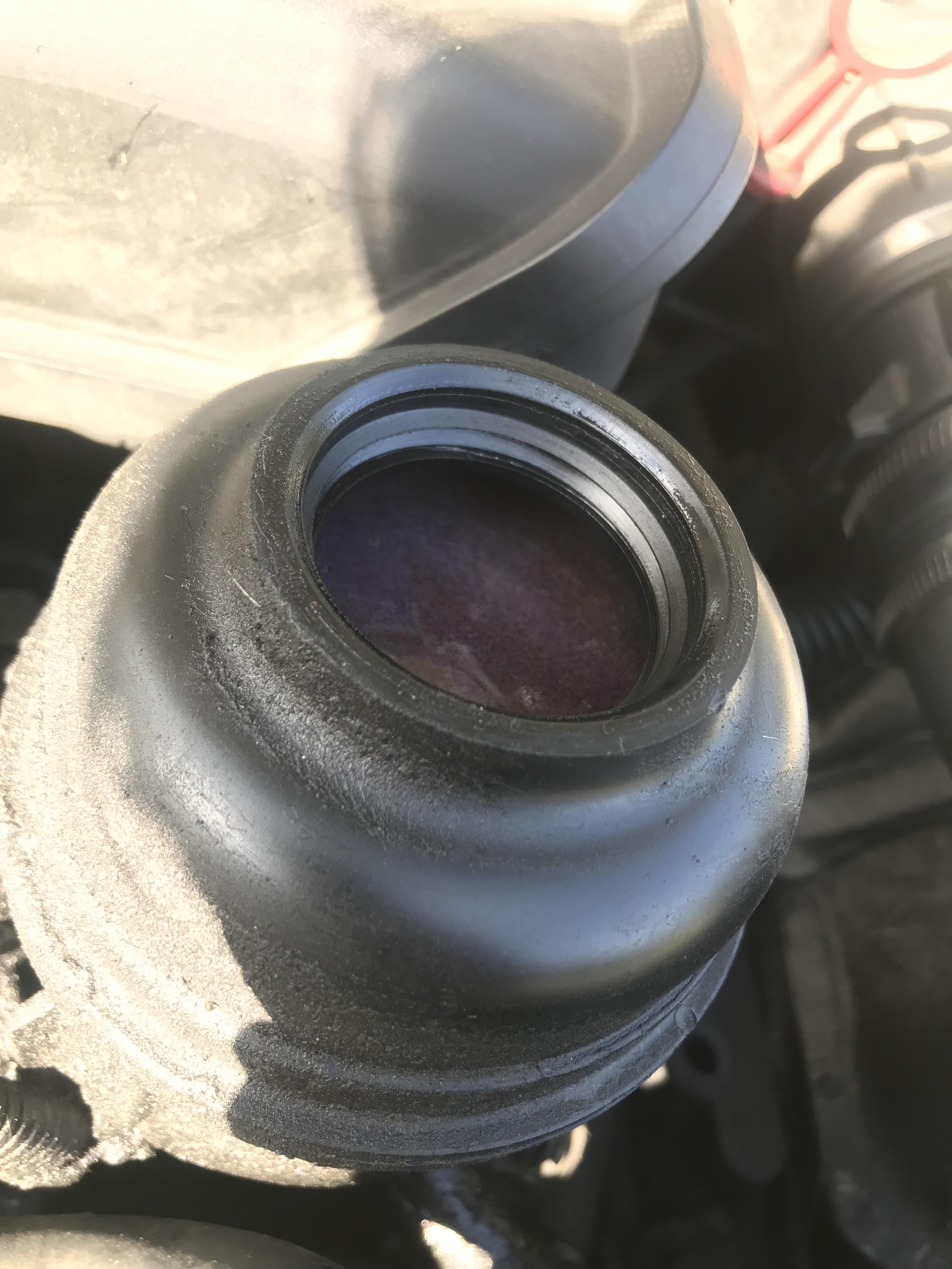 What is this grainy pink stuff in my power steering fluid? r